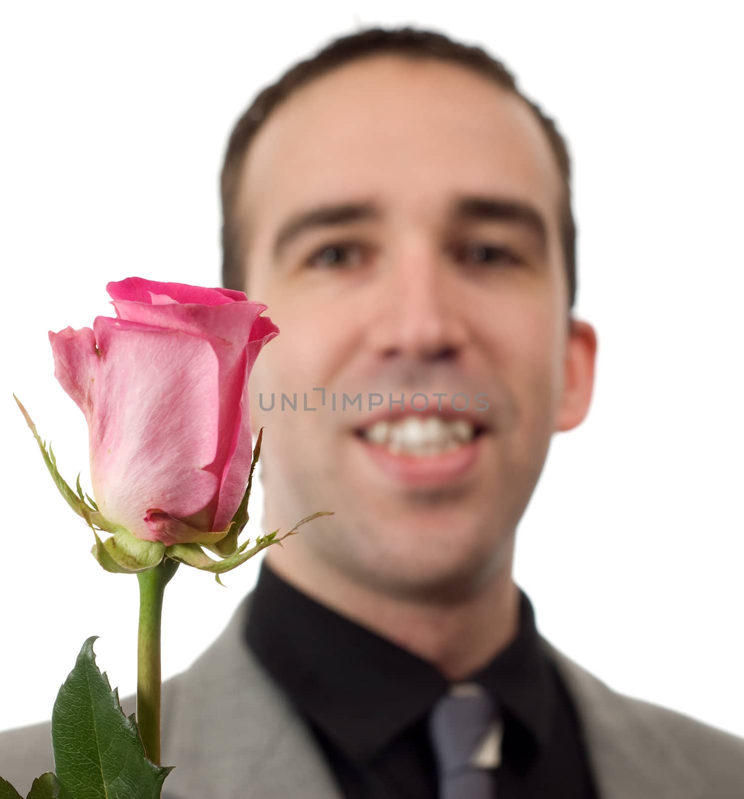 Closeup view of a romantic man and a rose, isolated against a white background