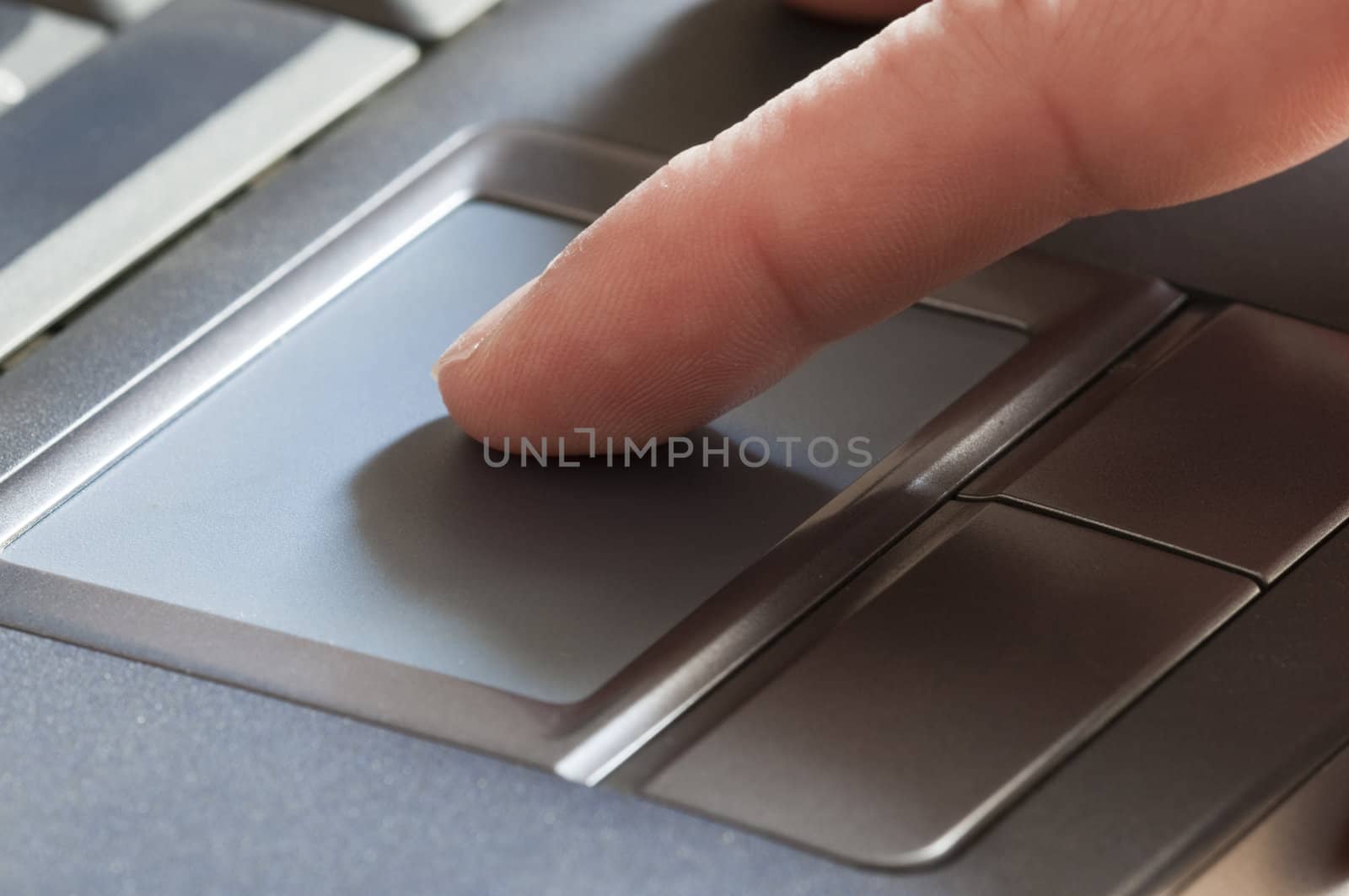 Notebook mouse pad with finger touching it by AlessandroZocc