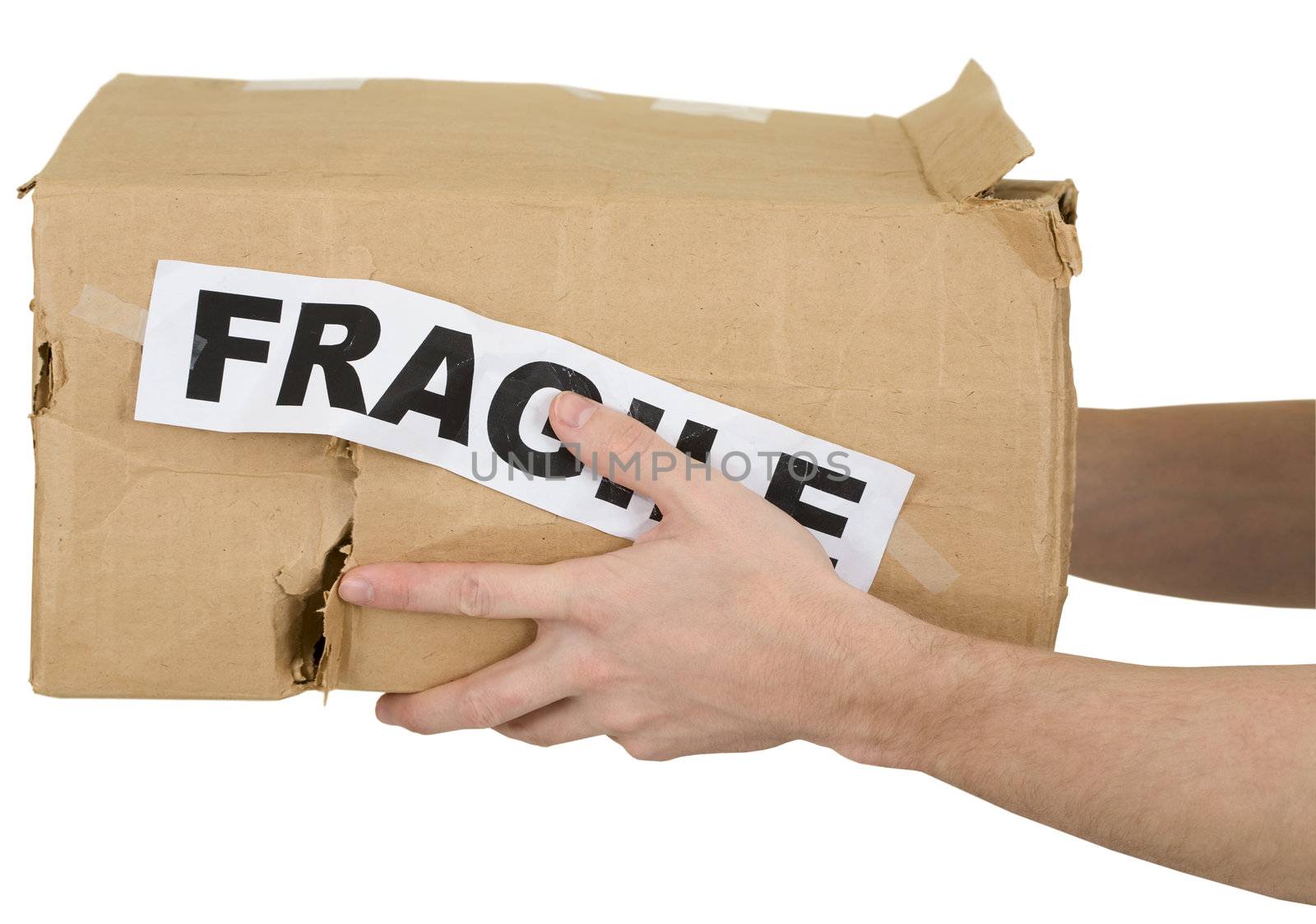 Crumpled cardboard box with inscription "fragile" on white background