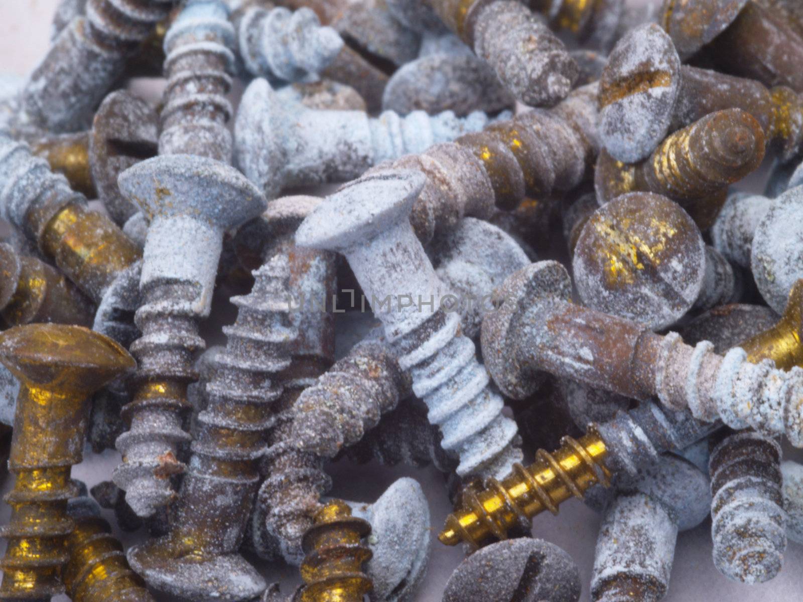 old corroded brass screws for use as a background