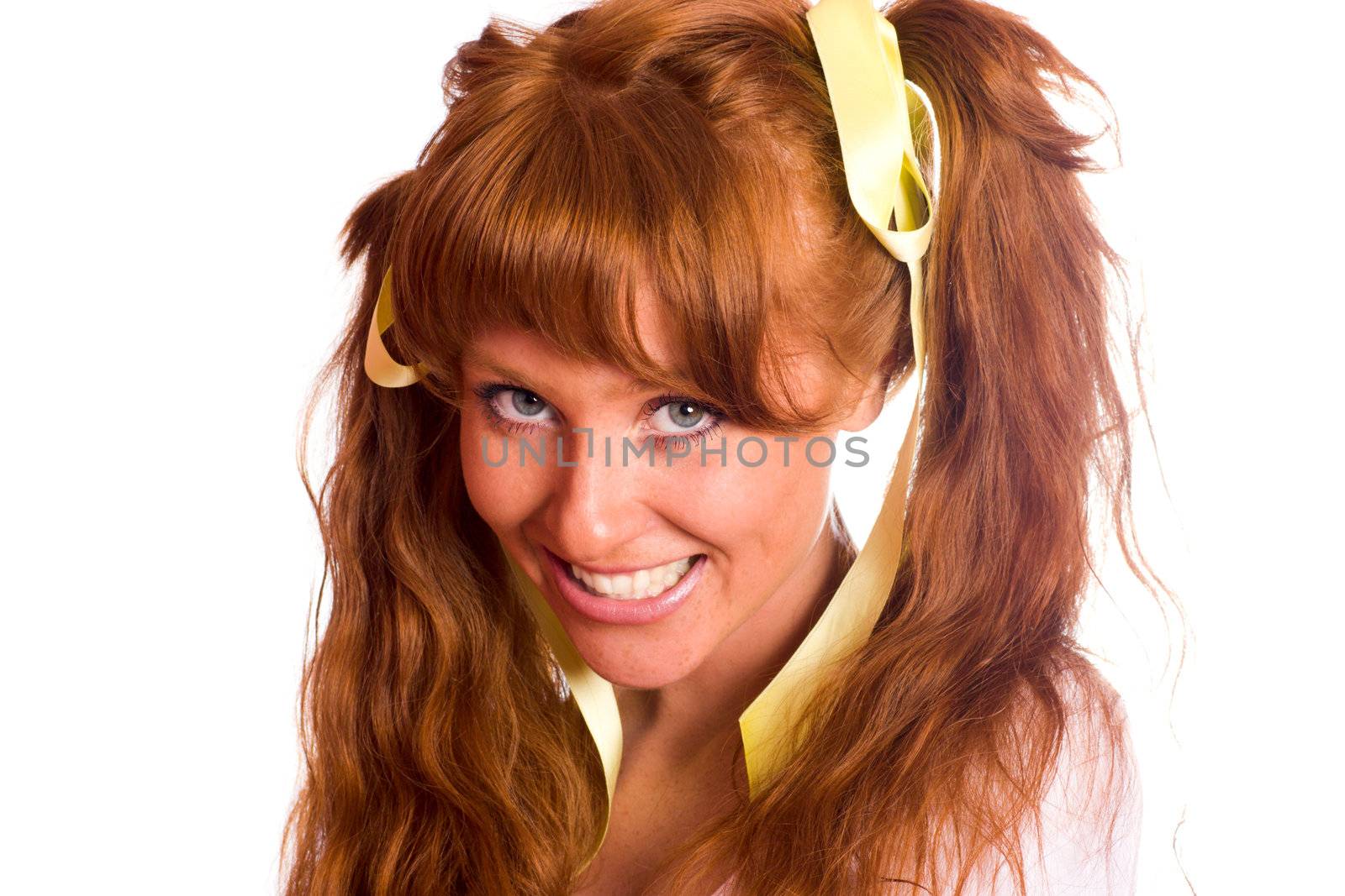 Redhead woman wearing ponytails isolated on white