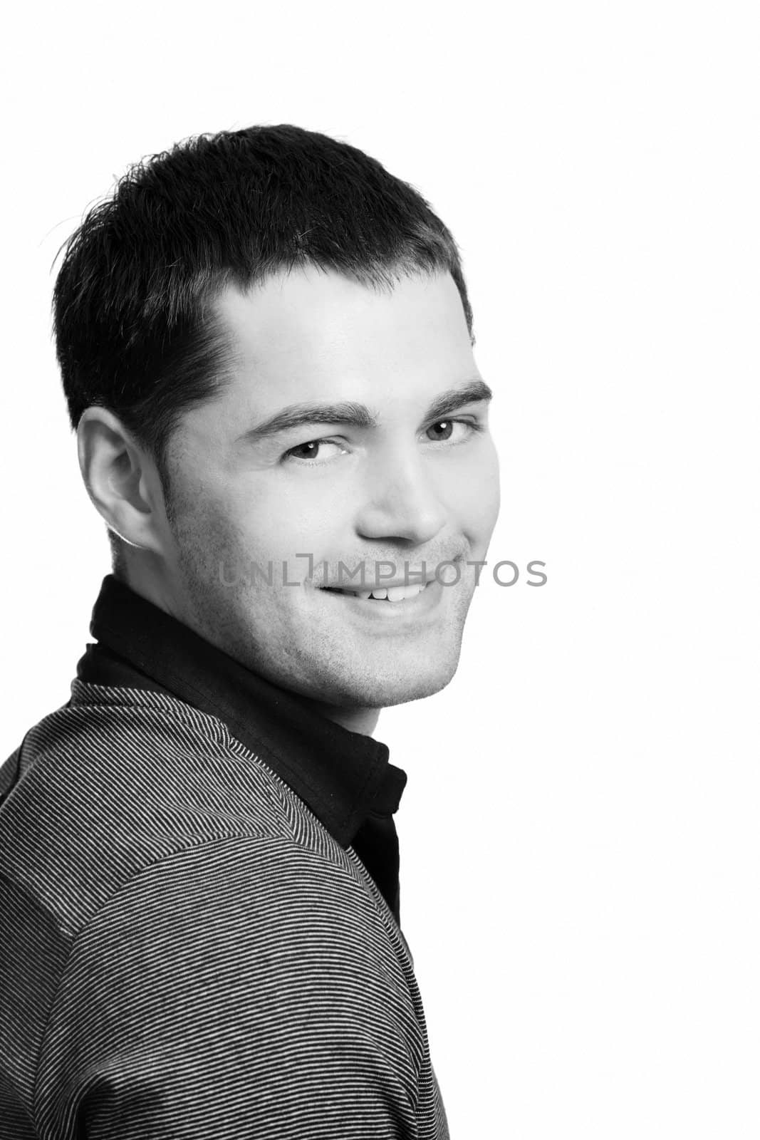 Smiling Young man's face close up isolated 