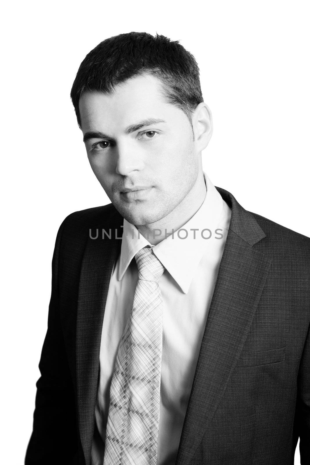 Portrait of Young man wearing suit with tie