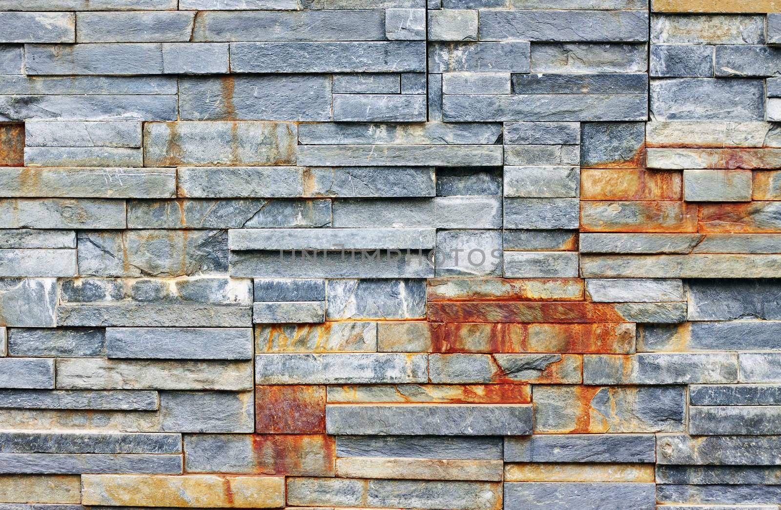 A wall made from stacks of shale rock. great background, texture or wallpaper.