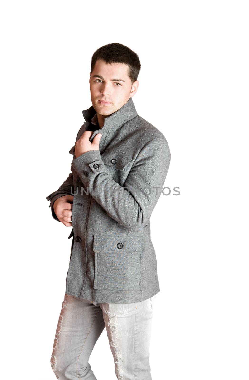 Portrait of Young man wearing coat isolated on white