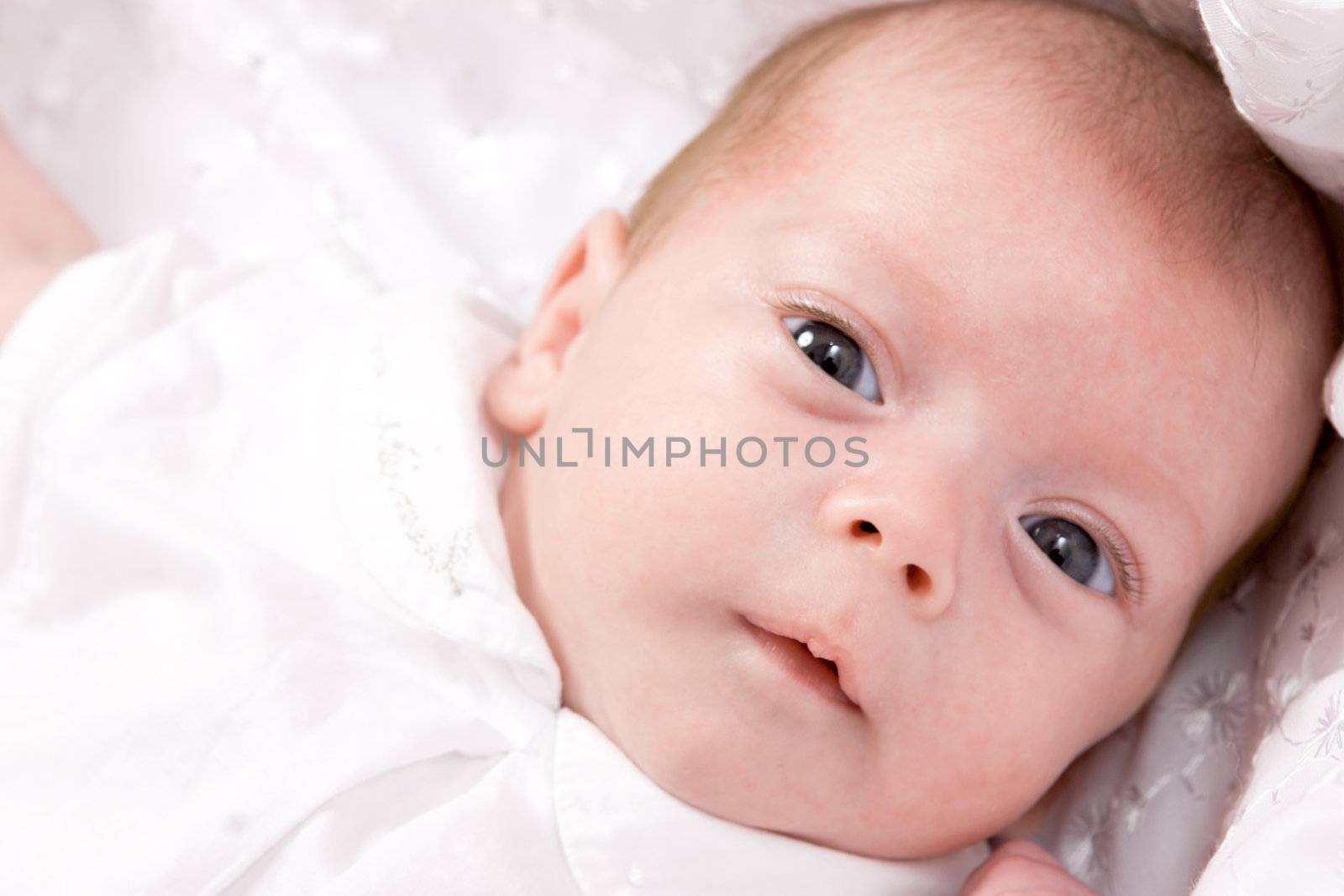 Baby girl's head in the age of one months