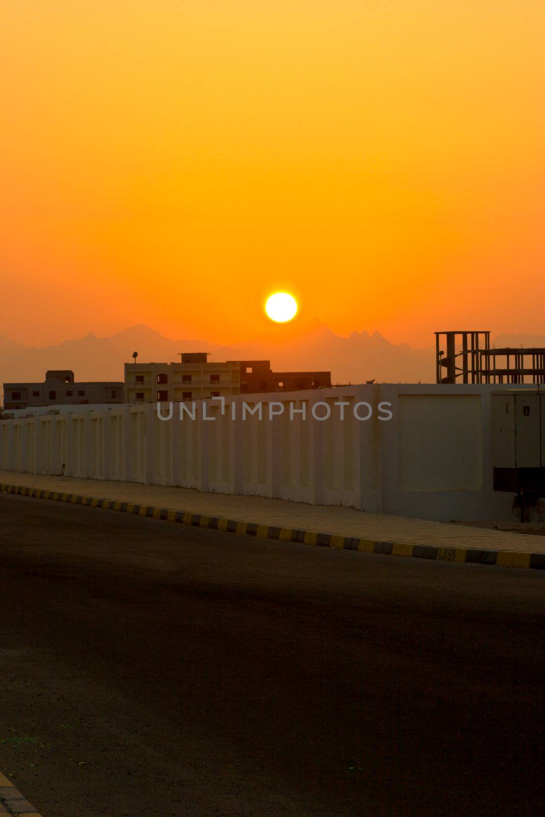 Sunset abowe construction in Egypt, Al Ghardaqah