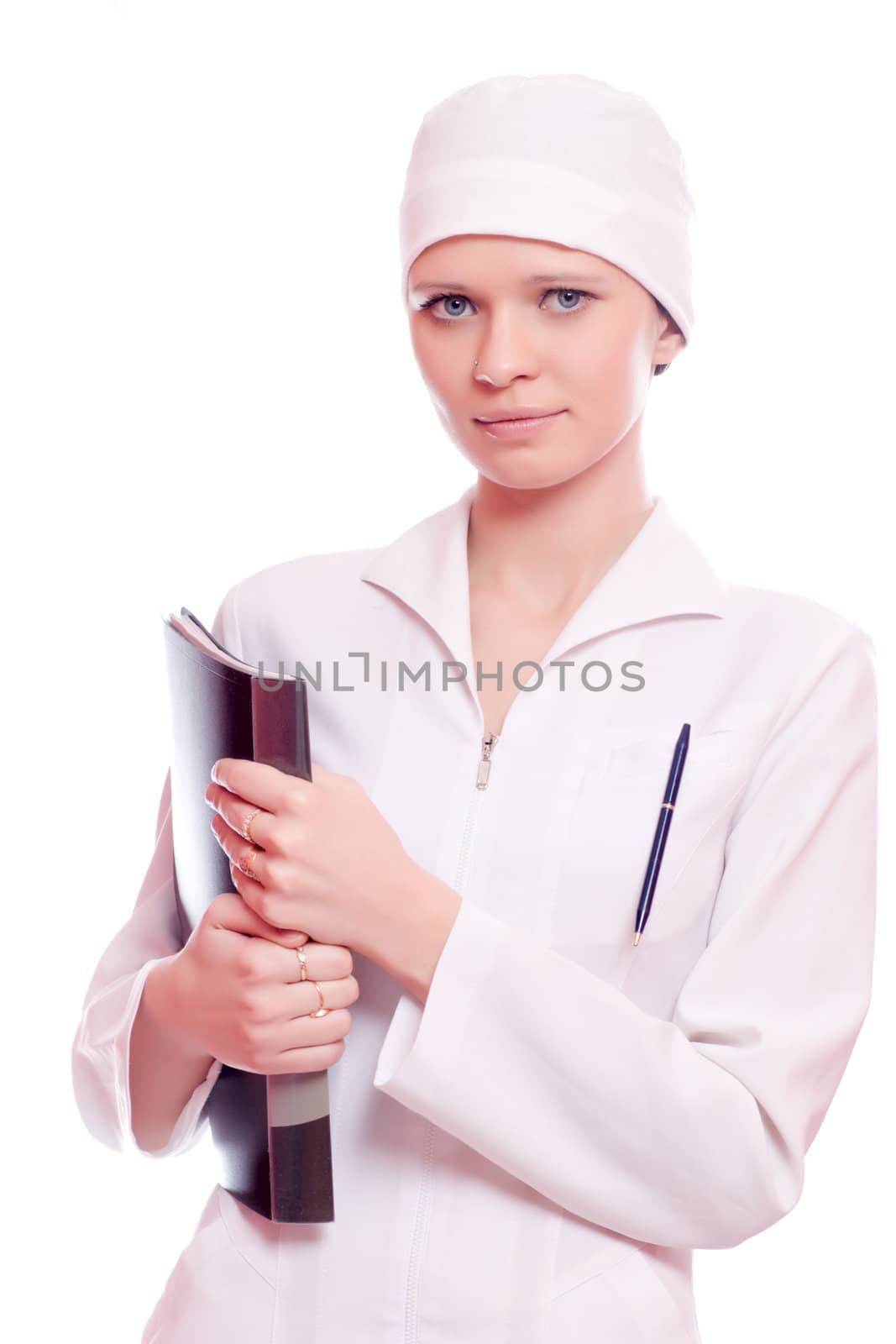 Beautiful young nurse holding file isolated on white