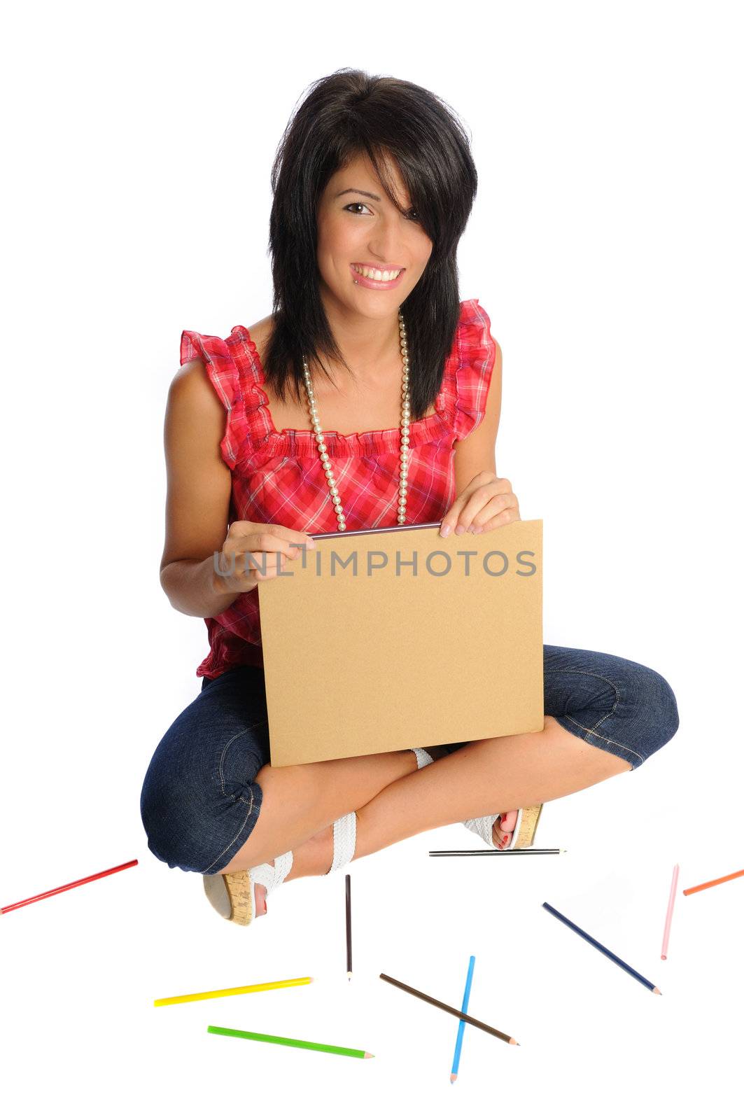 Attractive young woman on a white background with school or office supplies