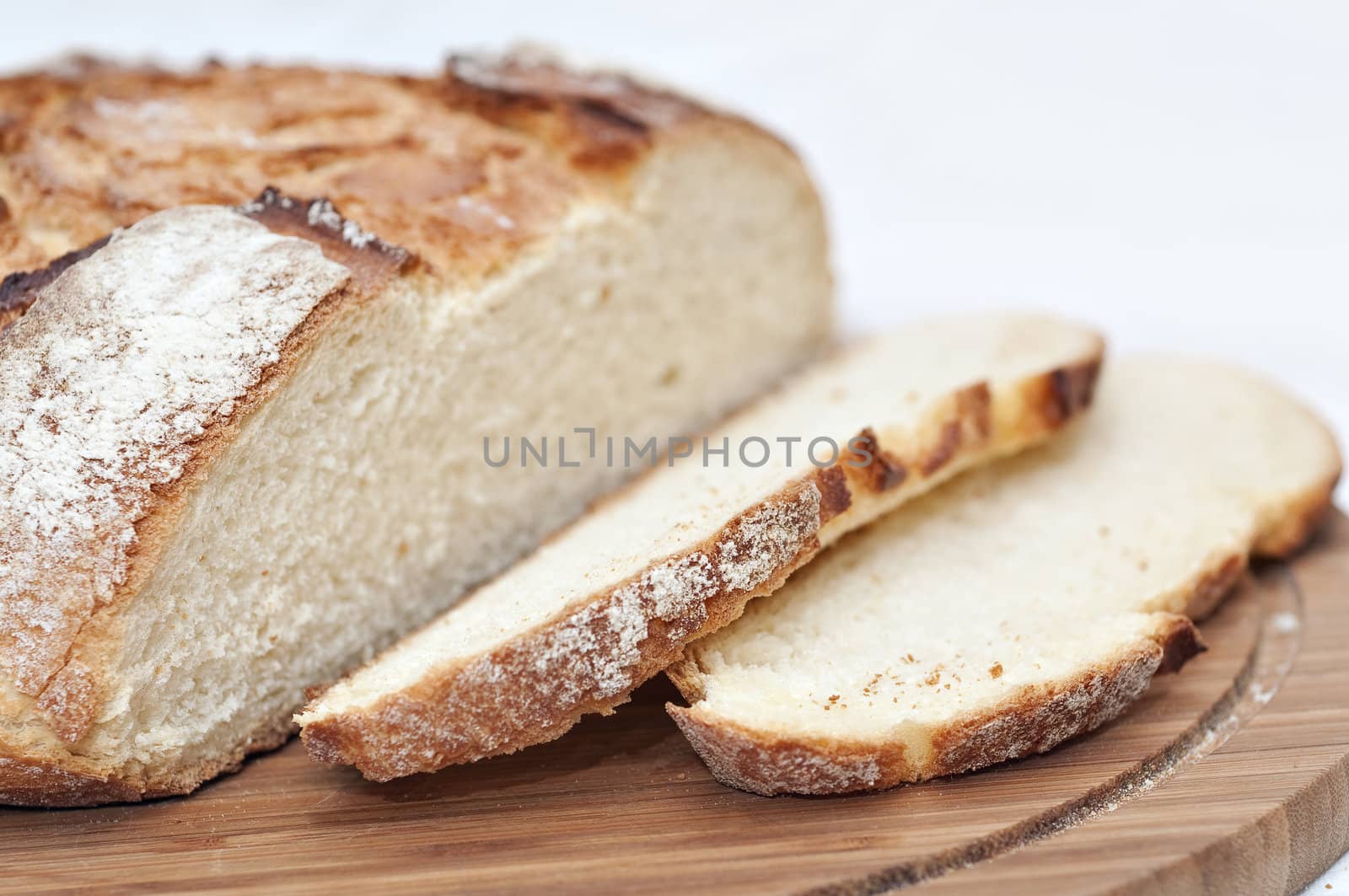 Slices of bread on a wooden plate