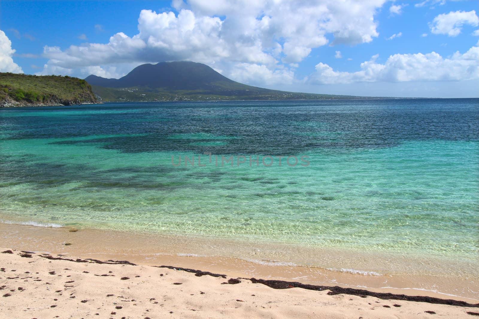 Tranquil beach and crystal clear water on Saint Kitts.