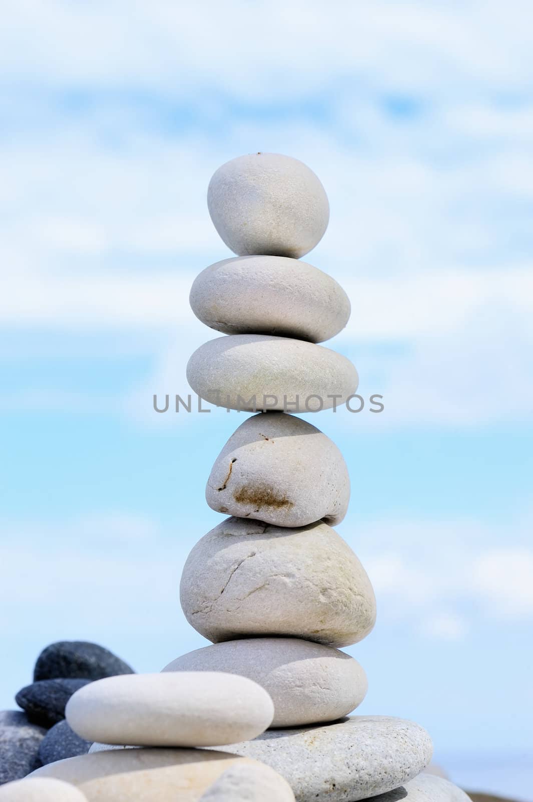 The pile of pebbles on the background of the sky