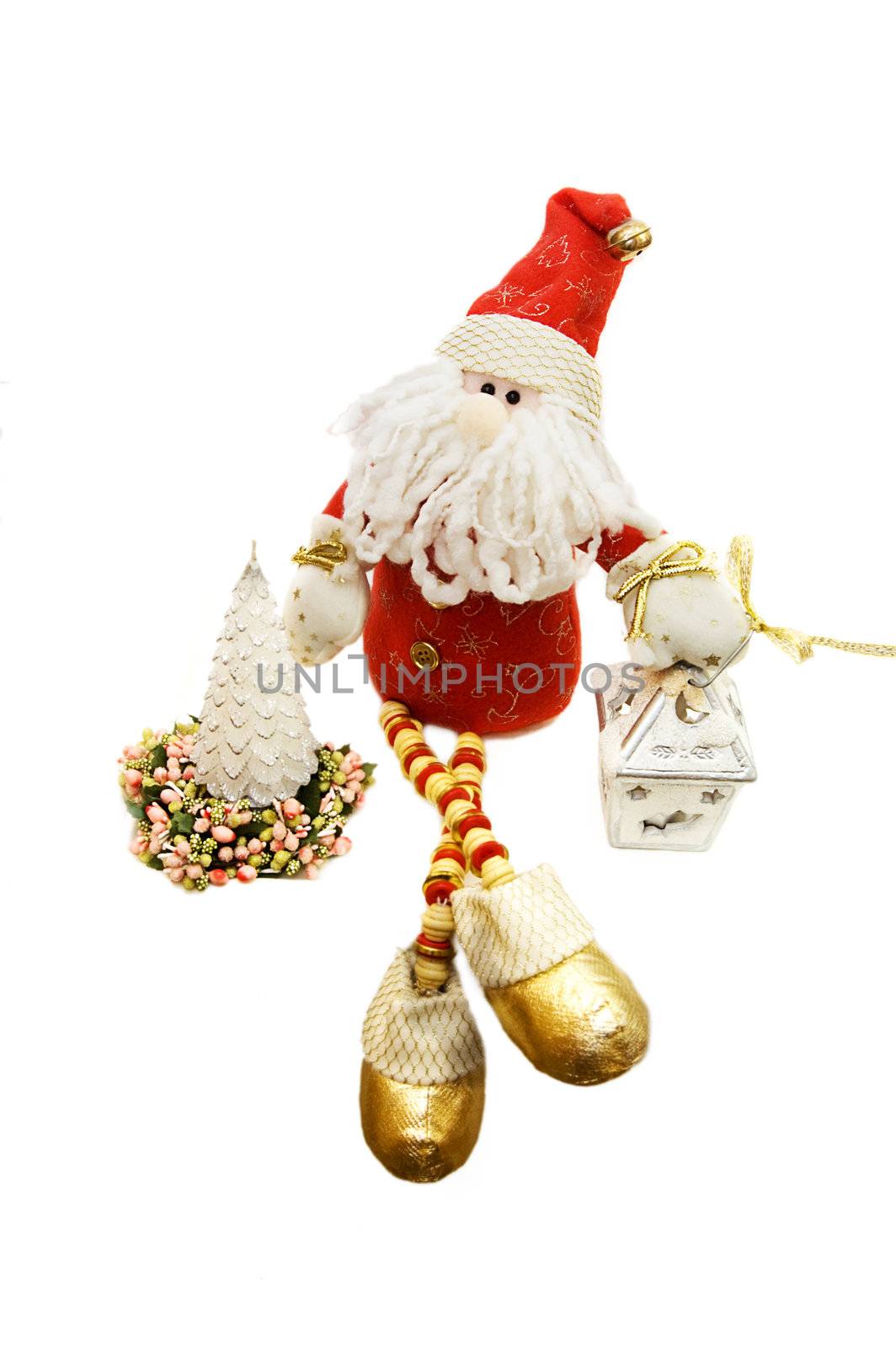 Santa Claus toy with Christmas tree on white