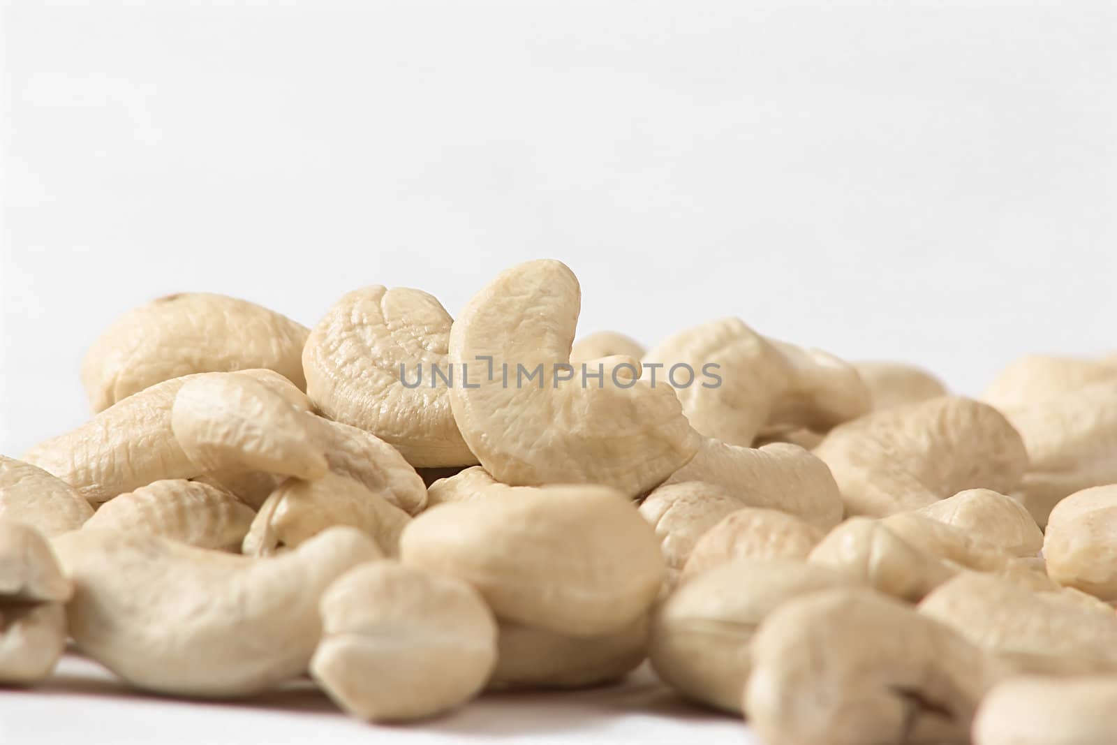 A Pile of raw cashew nuts, A healthy food source