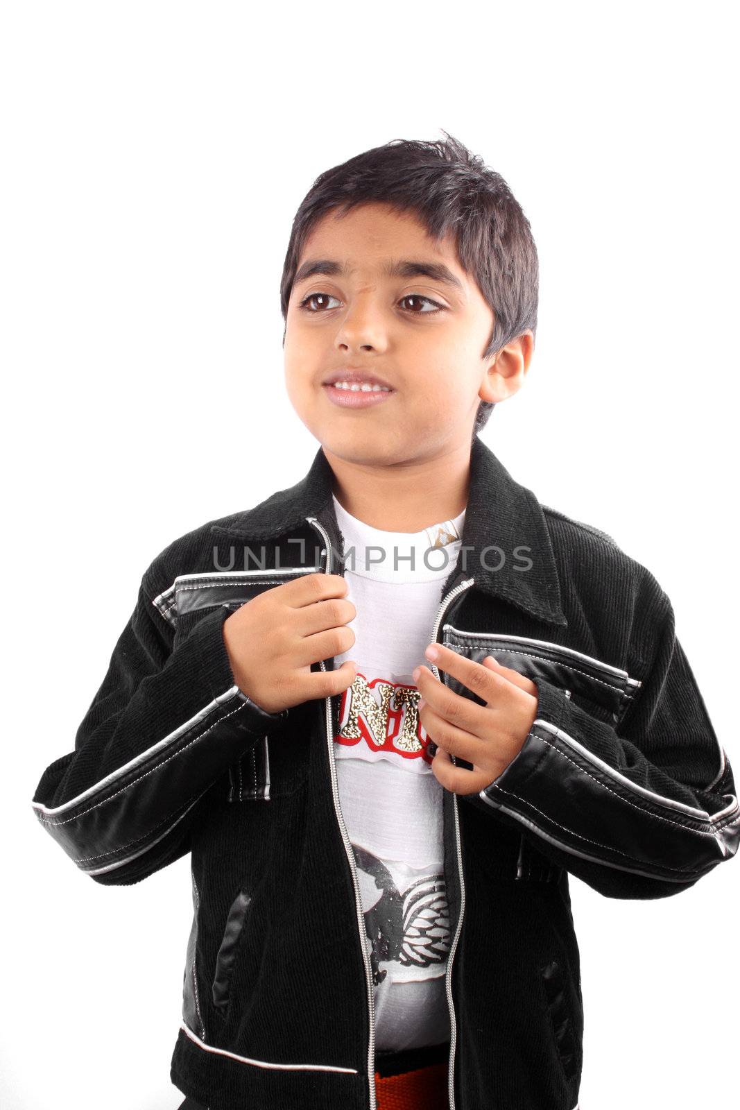 A little Indiian boy wearing a jacket getting ready for a party, on white studio background.