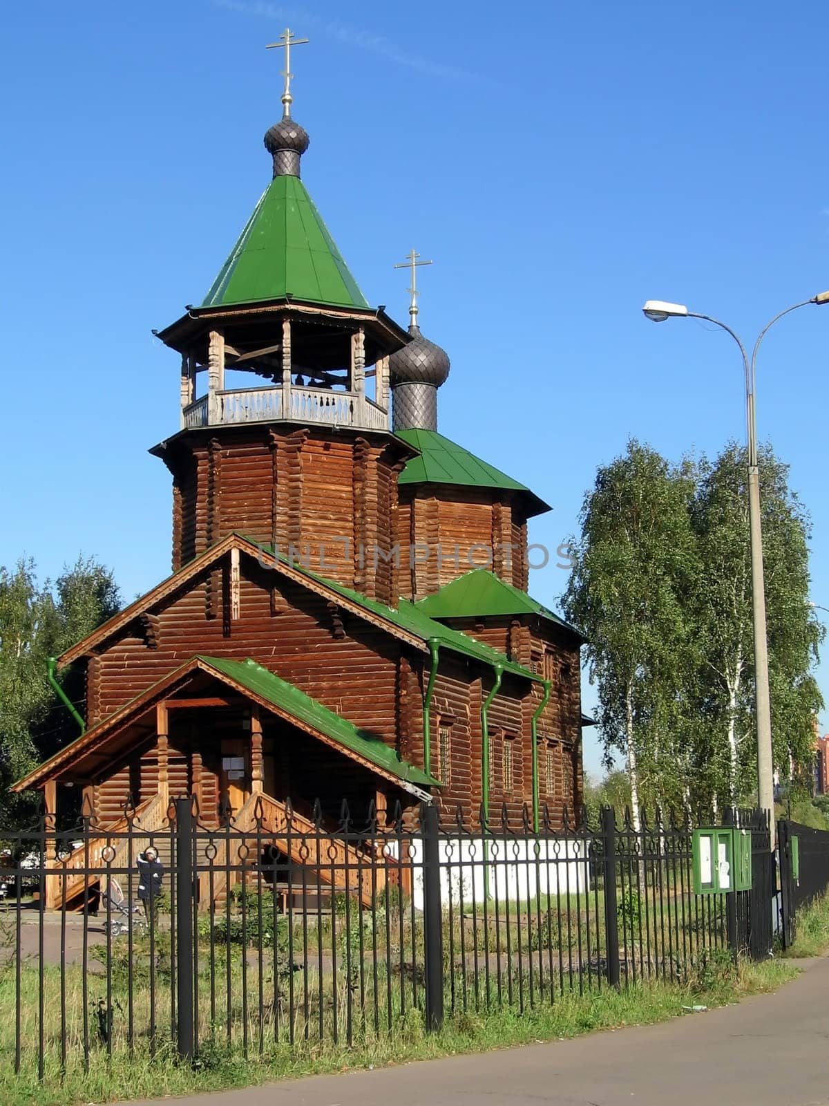 Wood Russian church on a background of blue sky