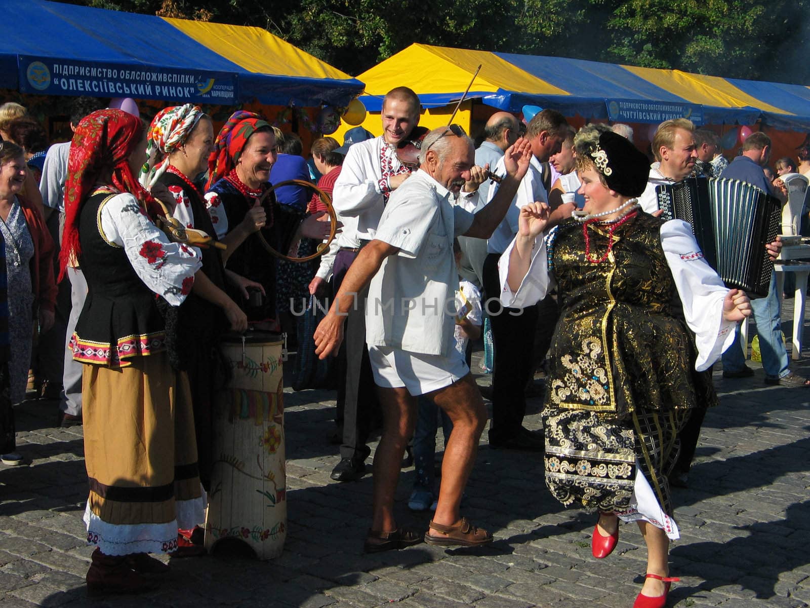 Cheerful national dances on a stone blocks during carrying out of fair in Kharkov Ukraine 19.08.2008 