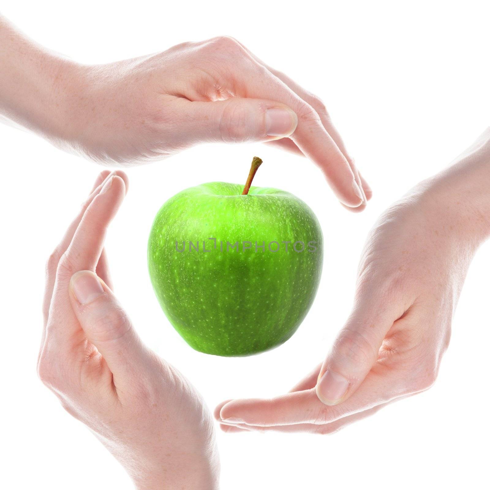 hand and apple isolated on a white background showing healthy food concept