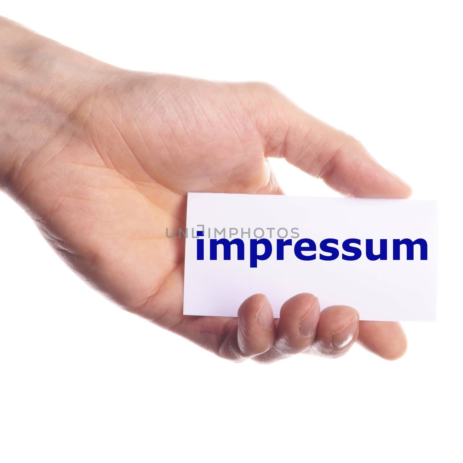 impressum concept with hand word and paper
