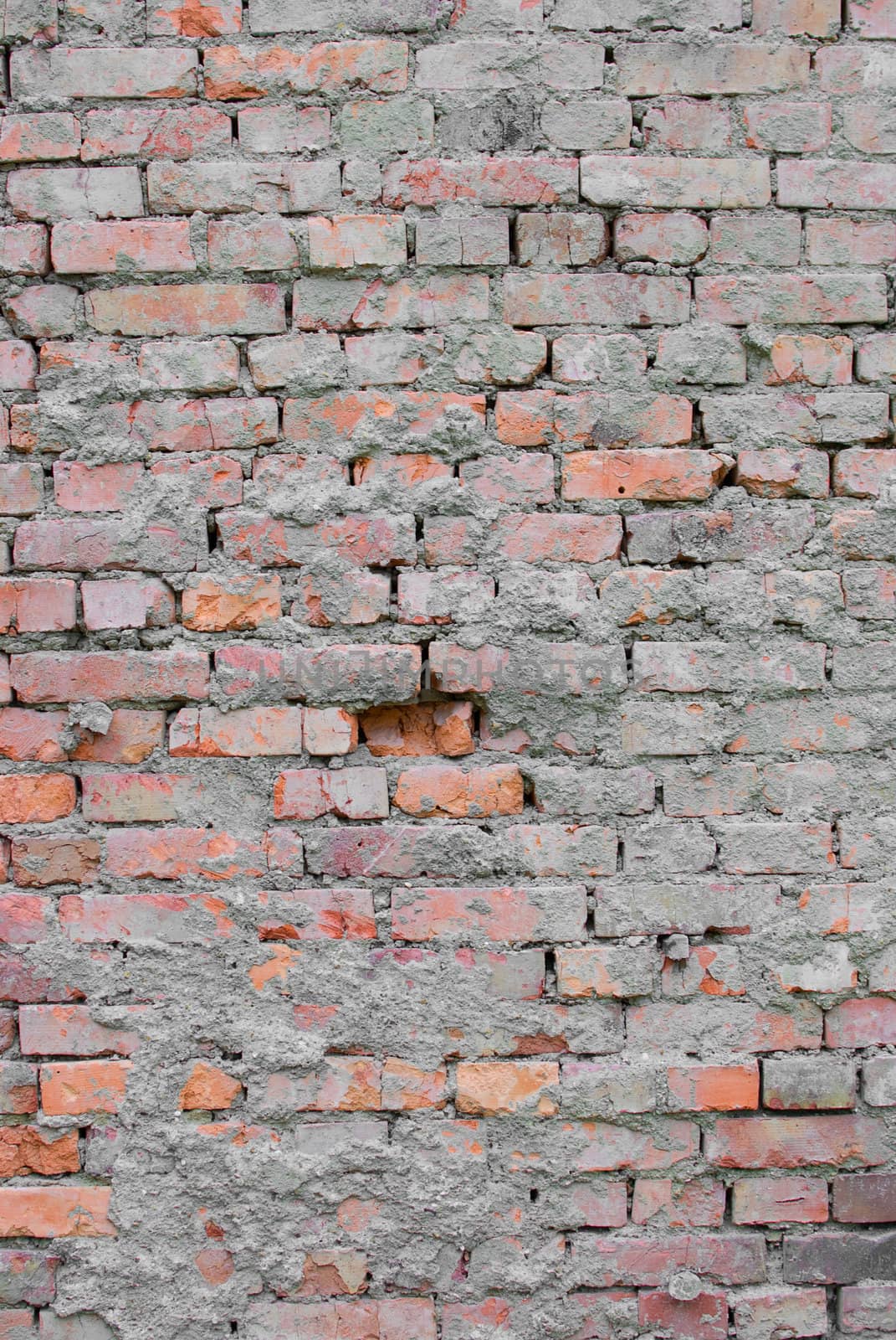 Cracked and old red brick wall texture