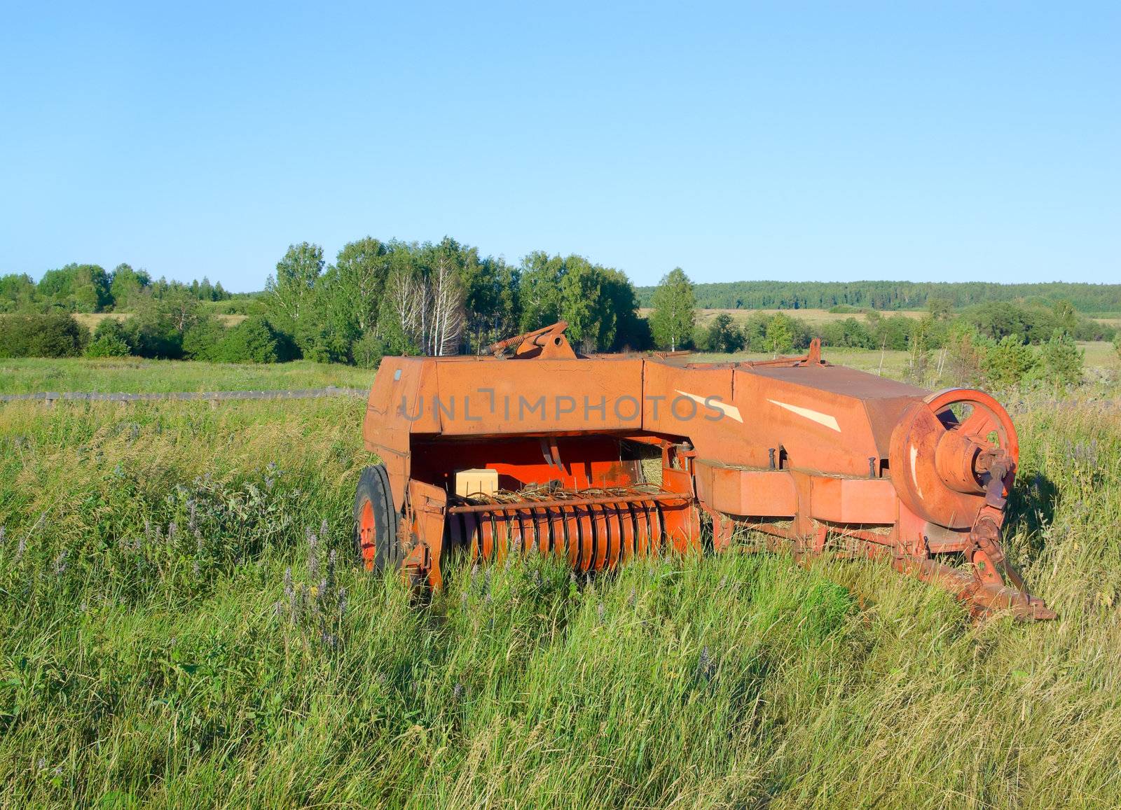 Part of the tractor used for mowing and gathering plants