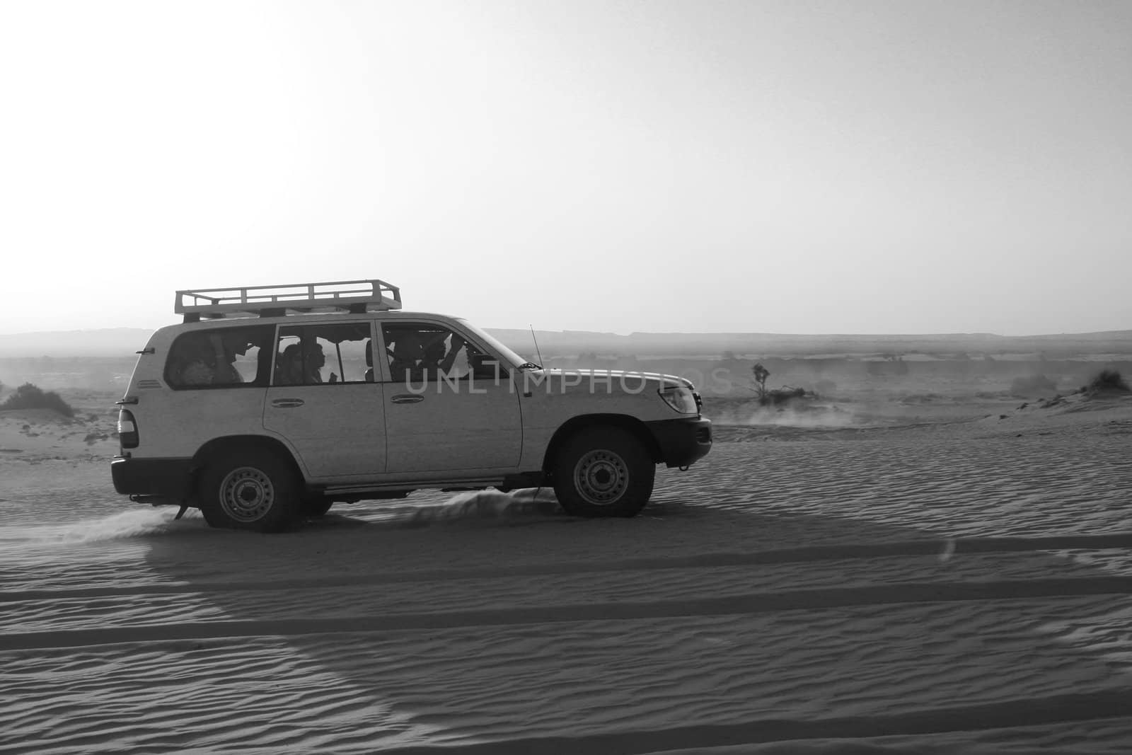 Riding ona jeep through the desert