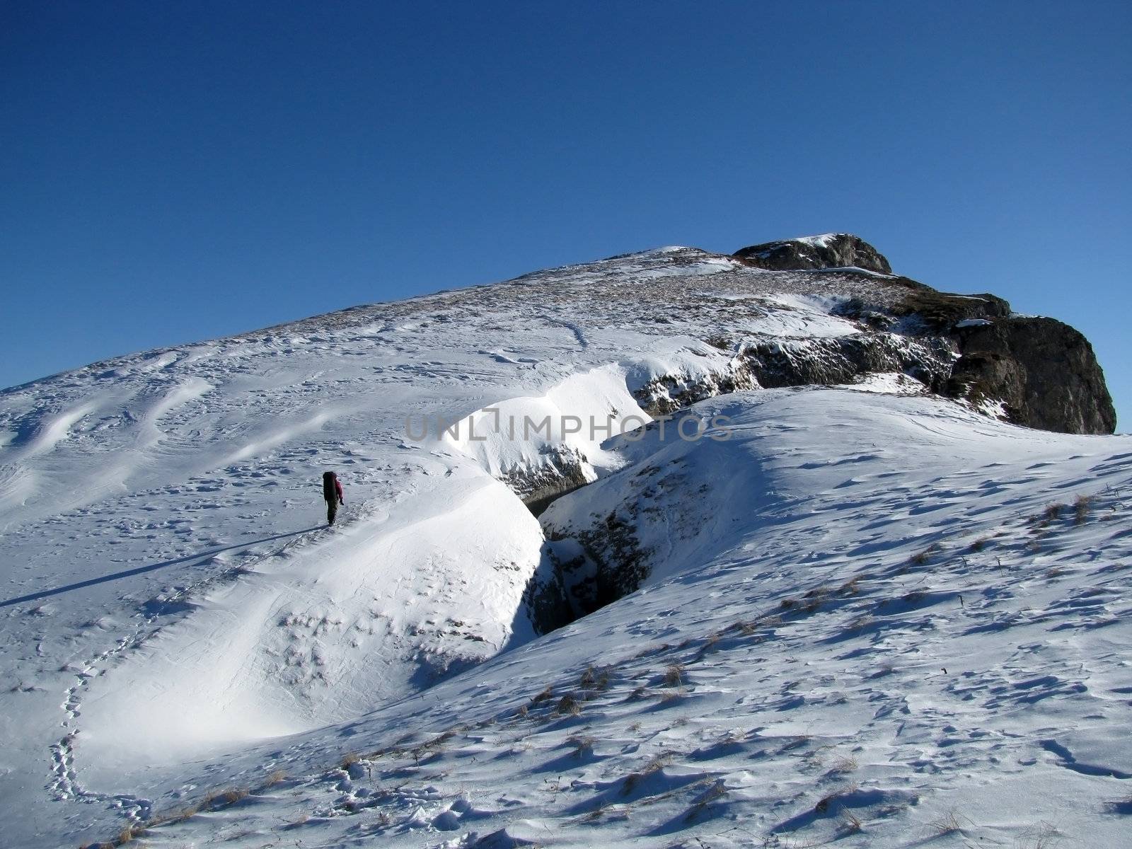 Mountains, caucasus, rocks, a relief, a landscape, the nature, a panorama, a landscape, a ridge, top, breed, the sky, reserve, a background, a kind, a route, a slope, peak, beauty, bright, a file, tourism, travel, winter, the tourist, the person, the guy, the man, sports, an ascension, the sun, snow