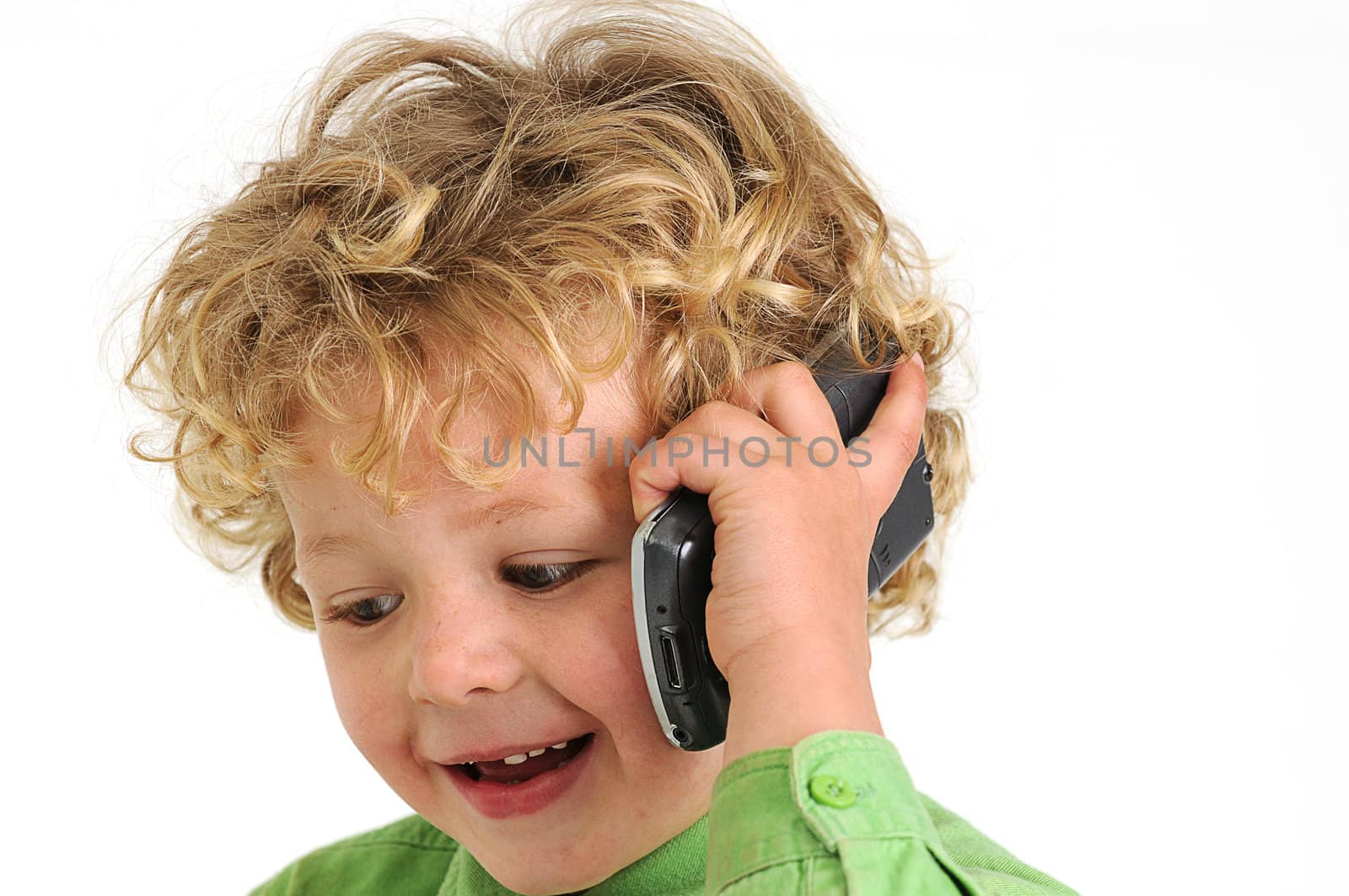 blond curly haired boy talking on mobile phone by Ansunette