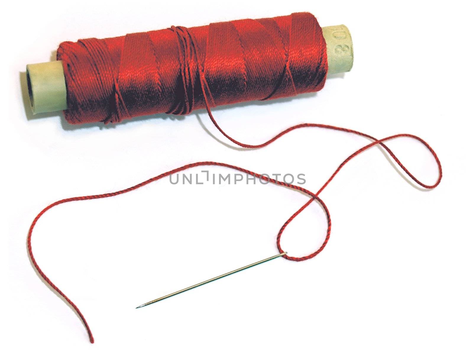 You can use the photo of a red thread (on the authentic millboard roll from the 60's) with a needle symbolic for any subject that needs an unbroken line to follow. Use the red thread as a symbol for coherrent subjects e.g. meetings, conferences, life or whatever needs a string or a strap ;-) When used as above the needle symbolizes the risk of getting stings, pricks and scratches whatever you'r up to. - or just use it as an illustration in ads where sewing, embroidery etc. is the main subject. The pure white background is easy to ajust into any size you want for your own message (simply add more white space around the photo).