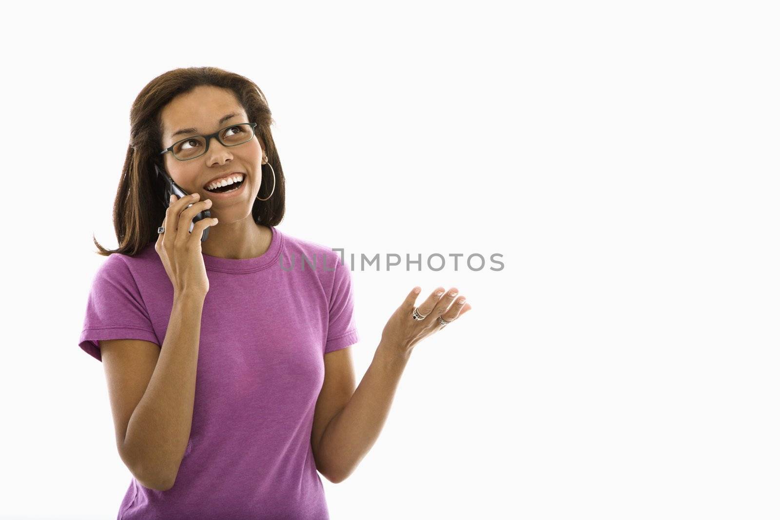 Woman talking on phone. by iofoto