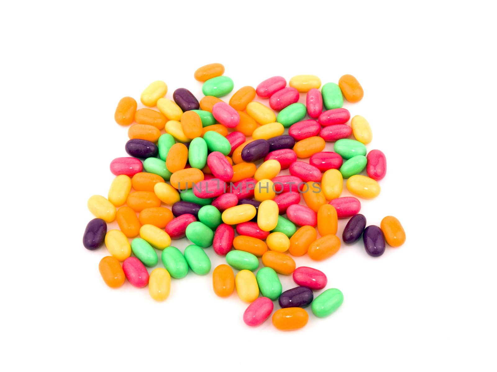 Colorful sweet candies on white background