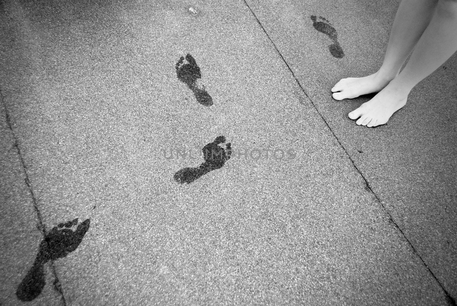 wet footprints after walking barefoot on the floor