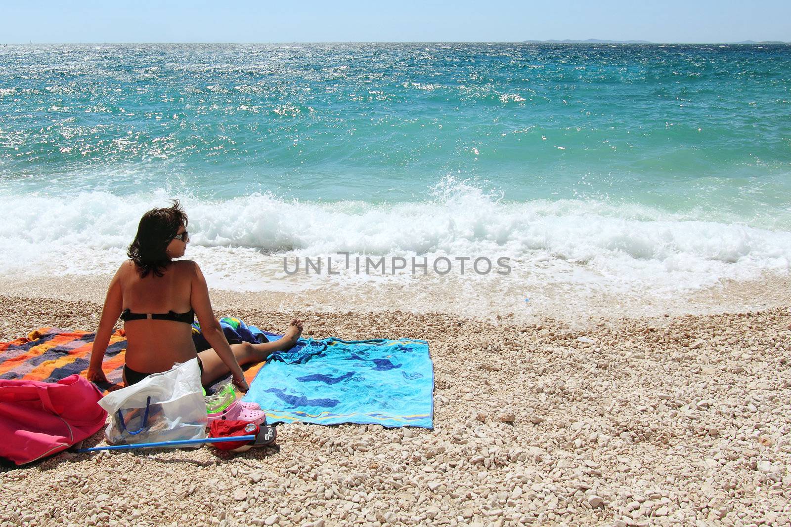 Middle age woman in the beach