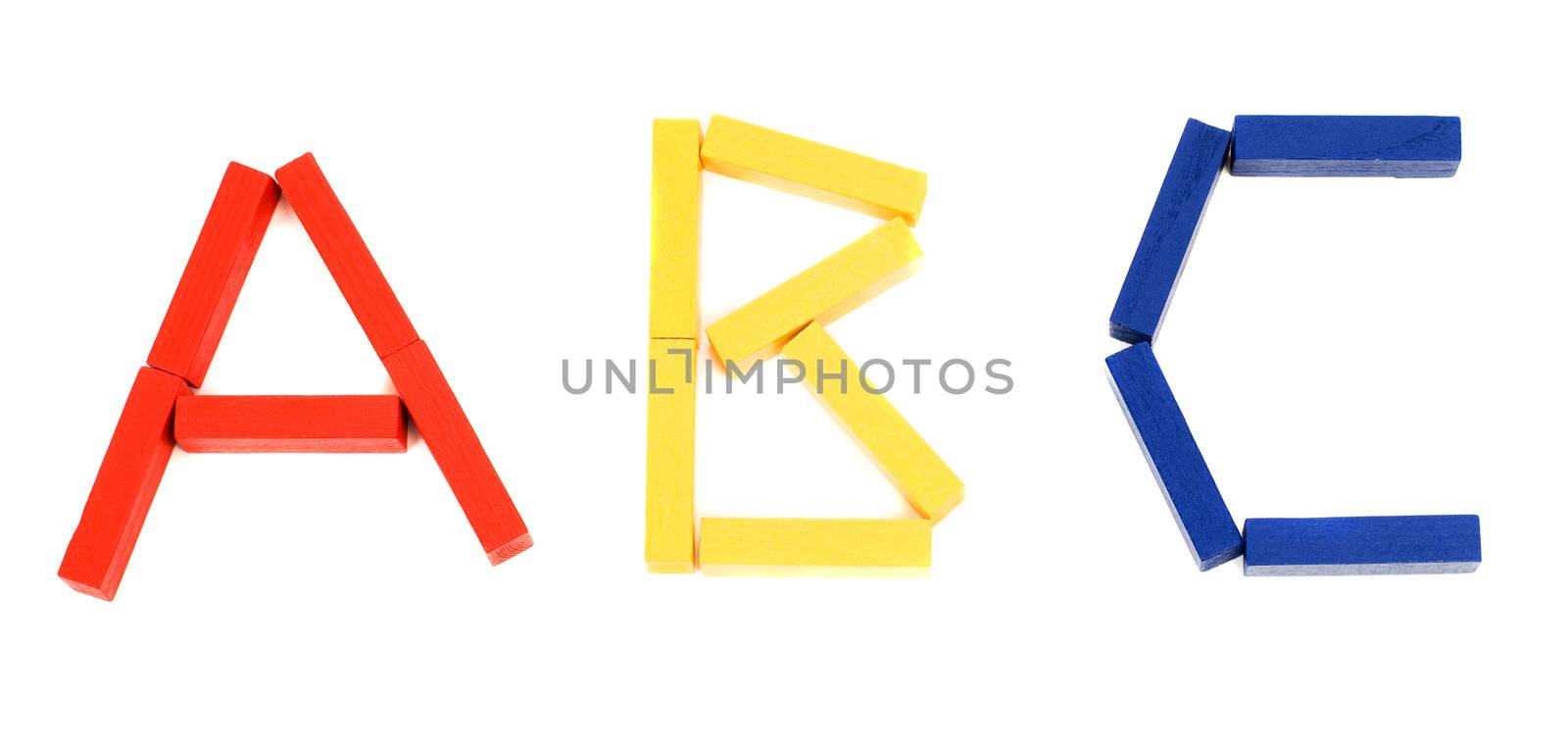 The letters abc spelled using long colored wooden blocks