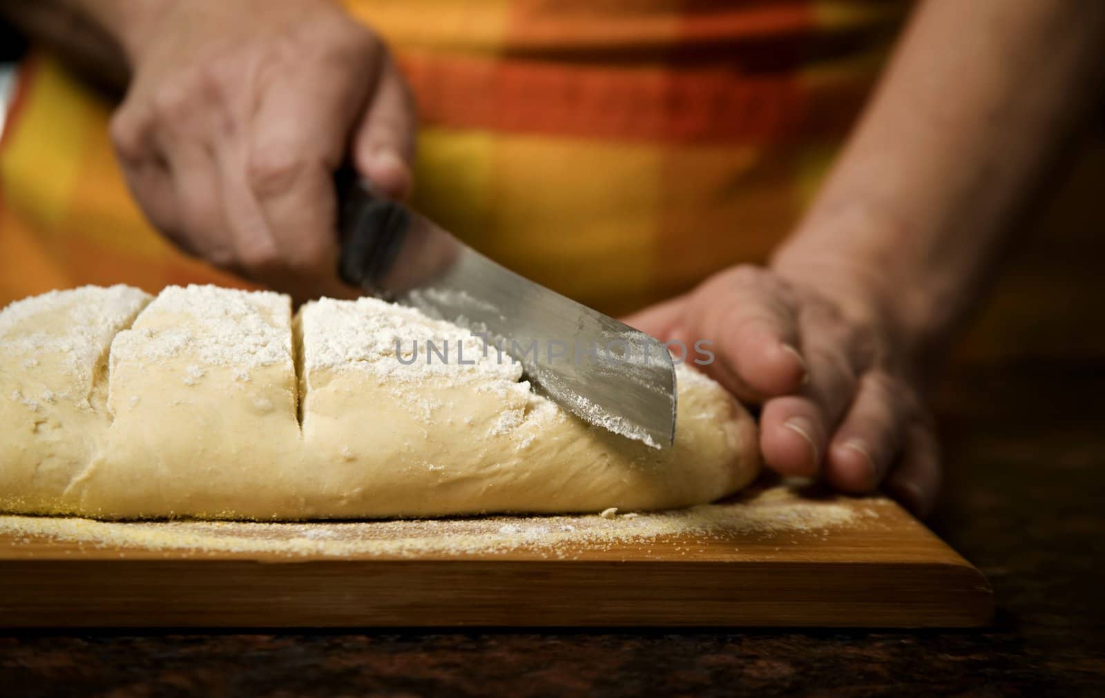 Adding cut to unbaked bread dough by Creatista