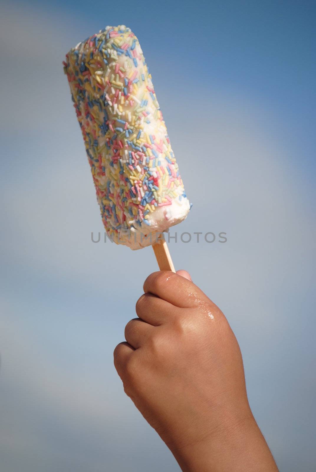 child hand with icecream