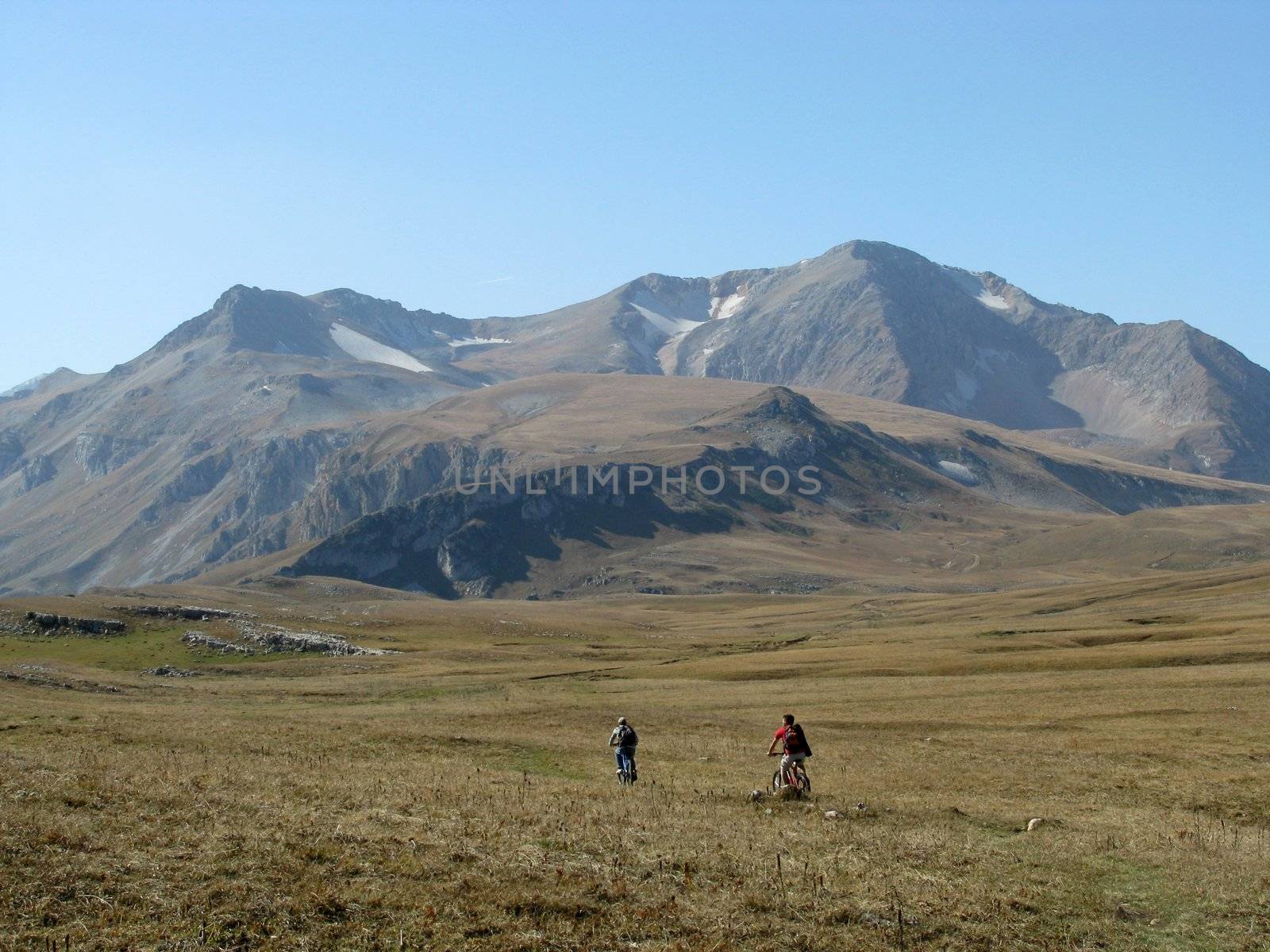 Mountains, caucasus, rocks, a relief, a landscape, the nature, a panorama, a landscape, a ridge, top, breed, the sky, reserve, a background, a kind, bicyclists, a slope, peak, beauty, bright, a file, a glacier, sports, tourists, a grass, the Alpine meadows, tourism, travel, productive leisure, autumnt