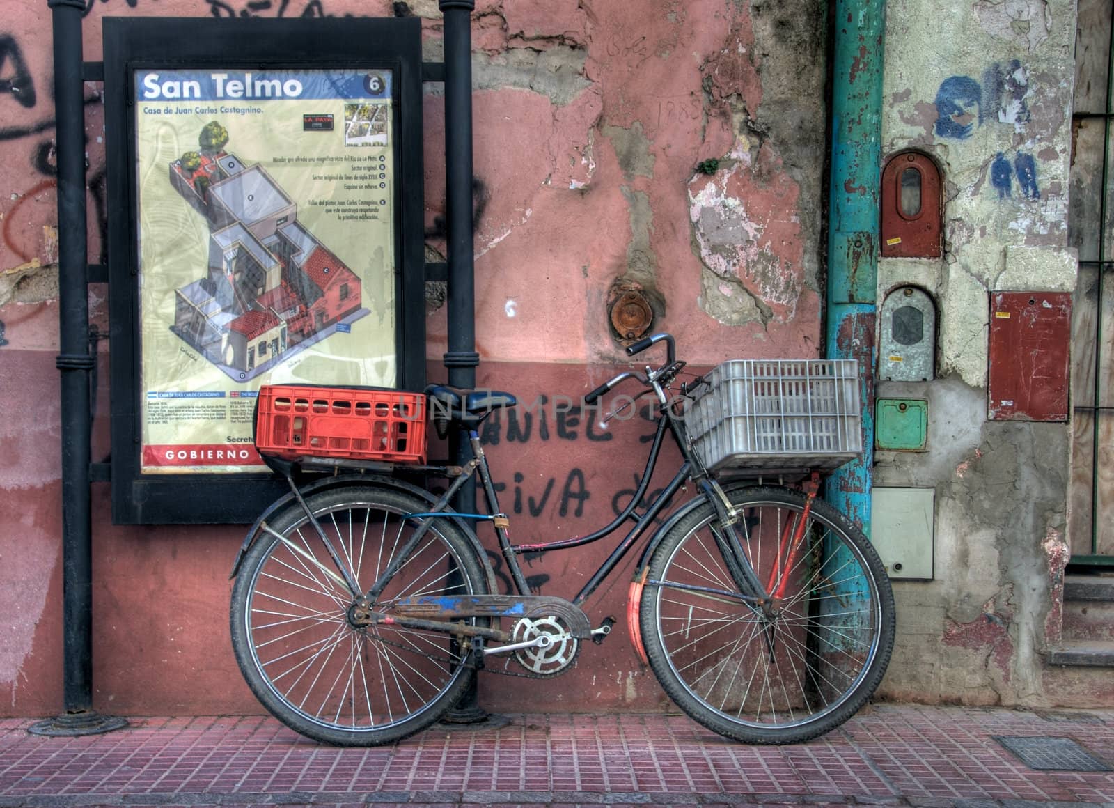 Old Bicycle in the neighborhood  of San Telmo, in Buenos Aires, Argentina.  This are of the city is a popular tourist destination.