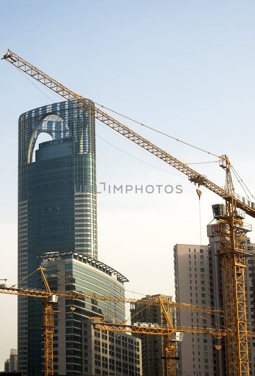 shanghai construction crane over modern building background