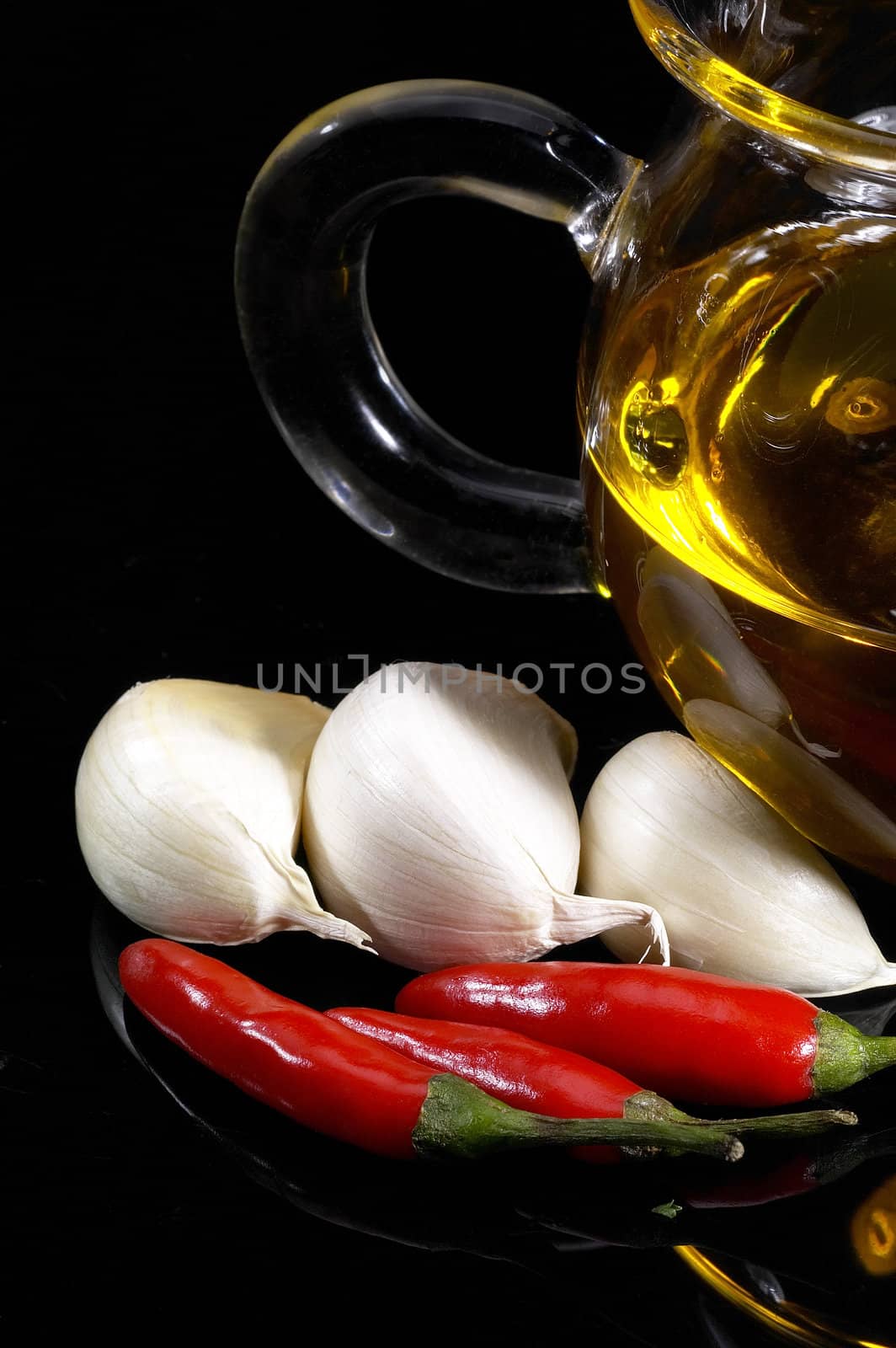 garlic extra virgin olive oil and red chili pepper by keko64