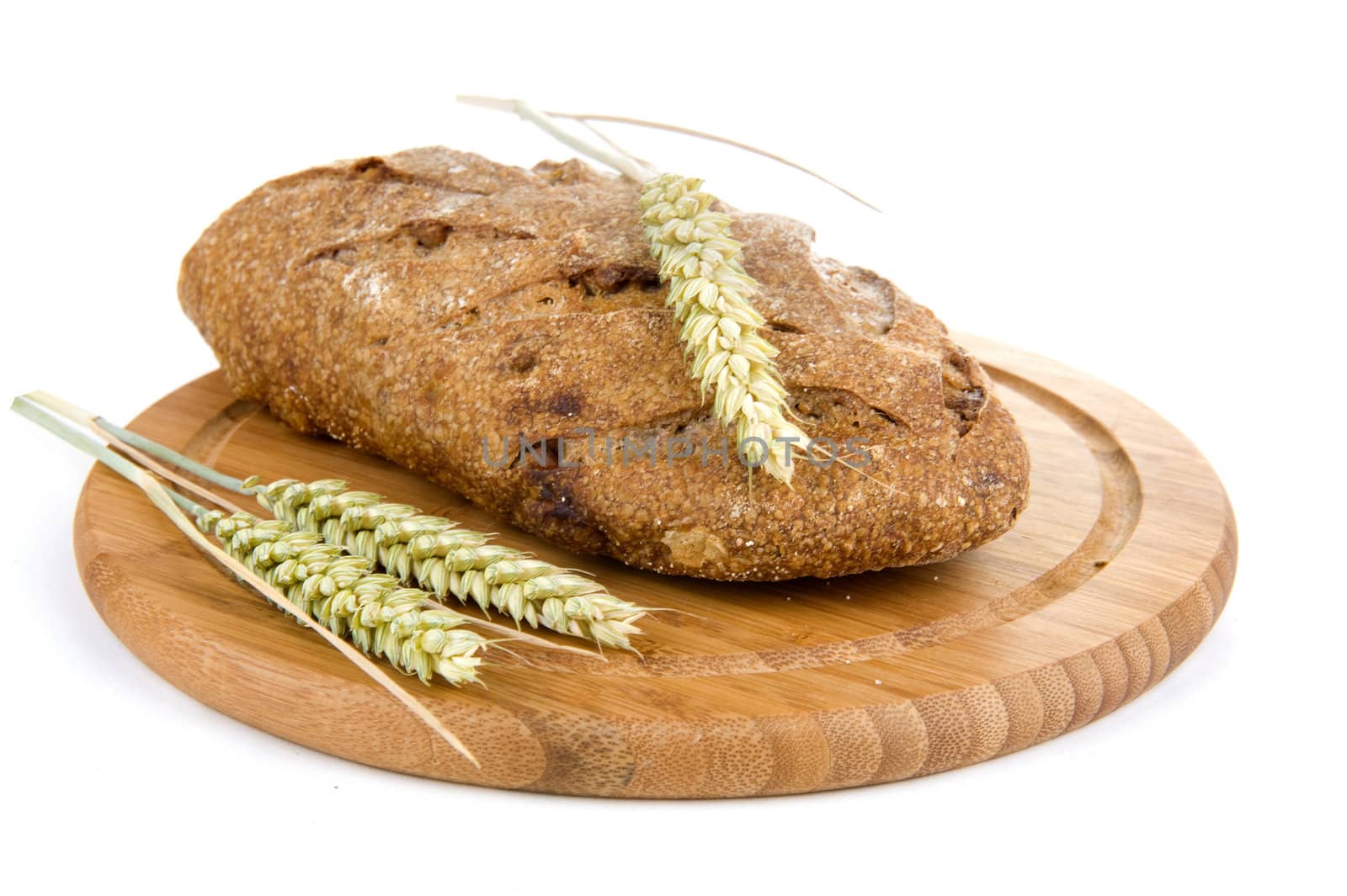 nut bread and grain on a cutting board