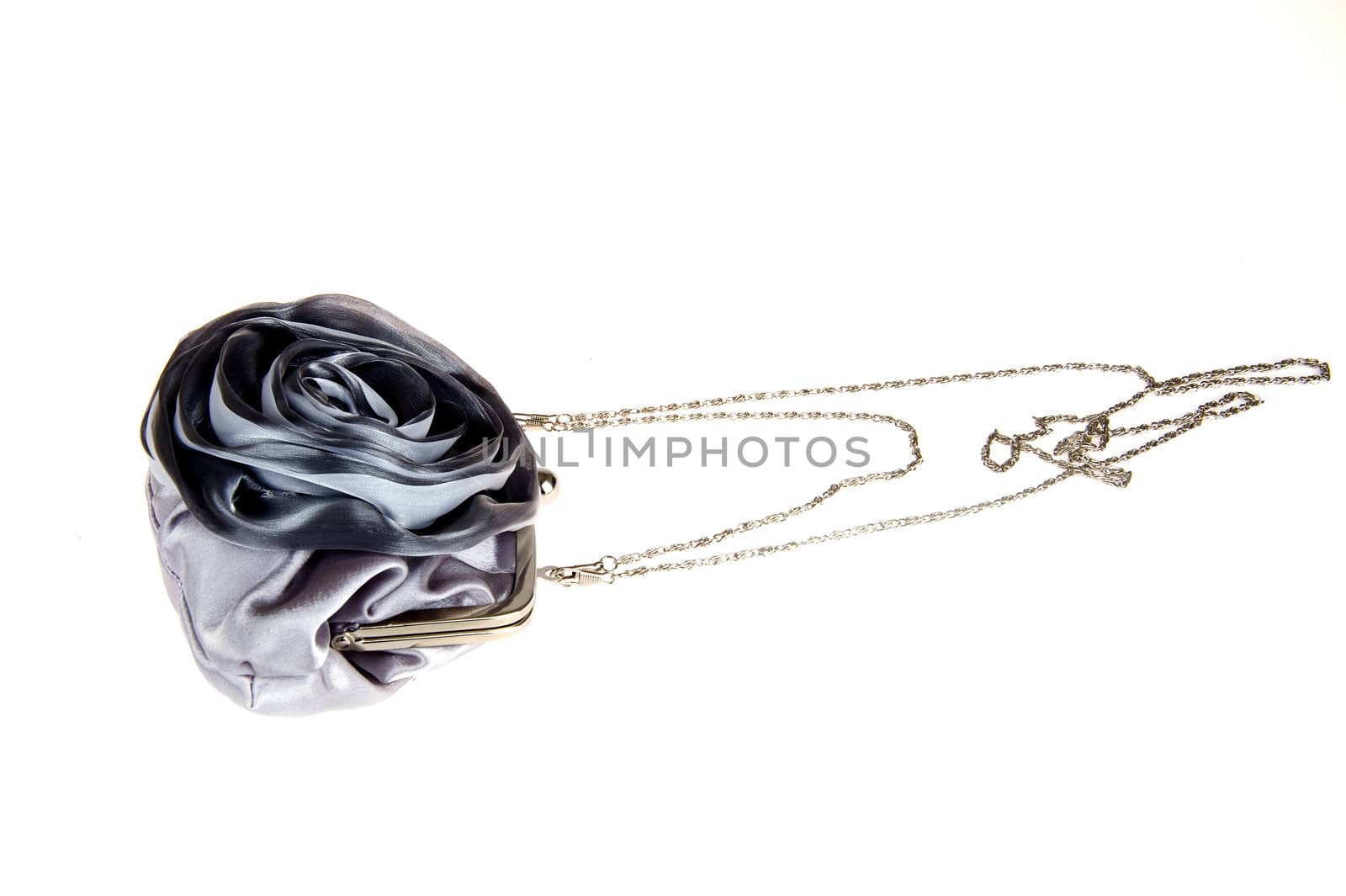 a silver handbag on a white background