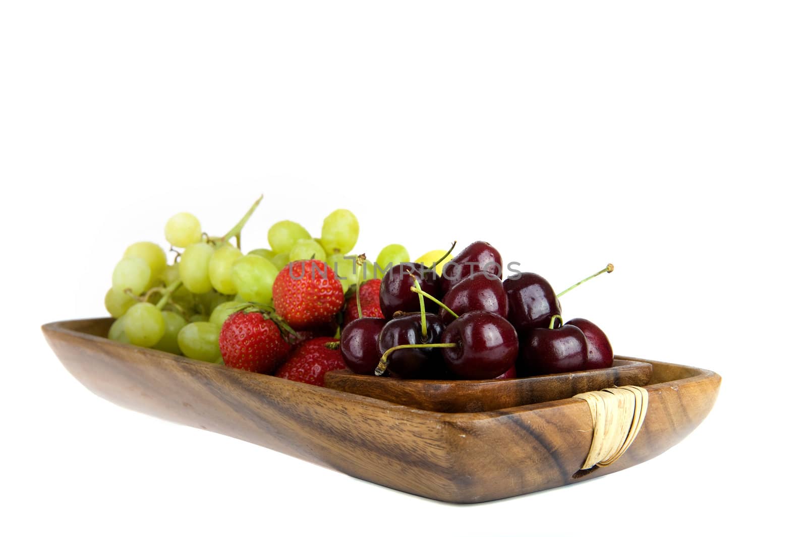 summerfruit in a wooden tray