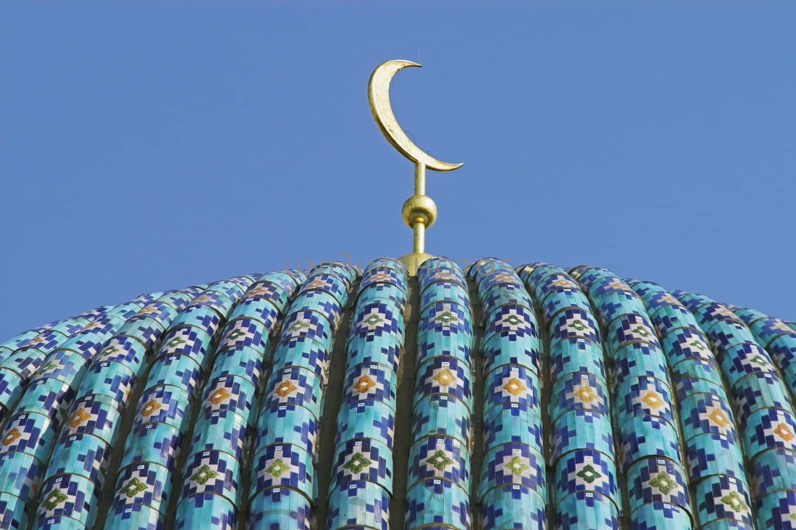 The top of the tiled dome With Arabic mosaics of the ancient mosque in Saint Petersburg, Russia.