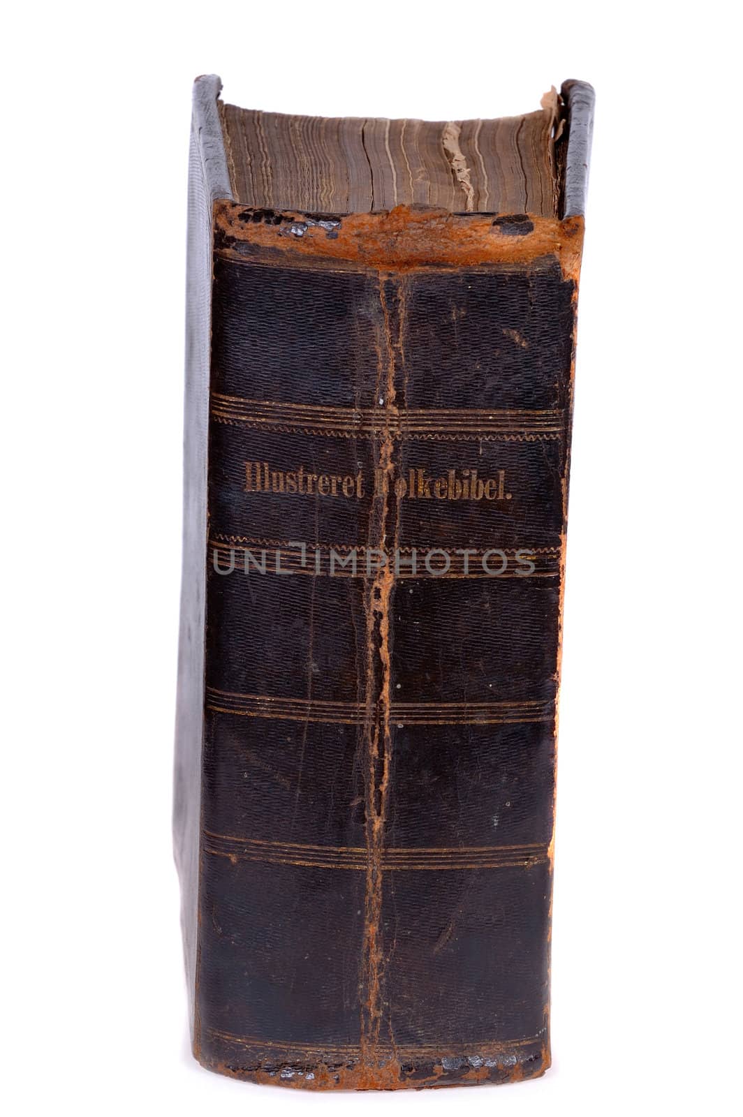 Old bible, over 100 years old, taken on clean white background. On the back it is written: Ilustrated peopels bible.