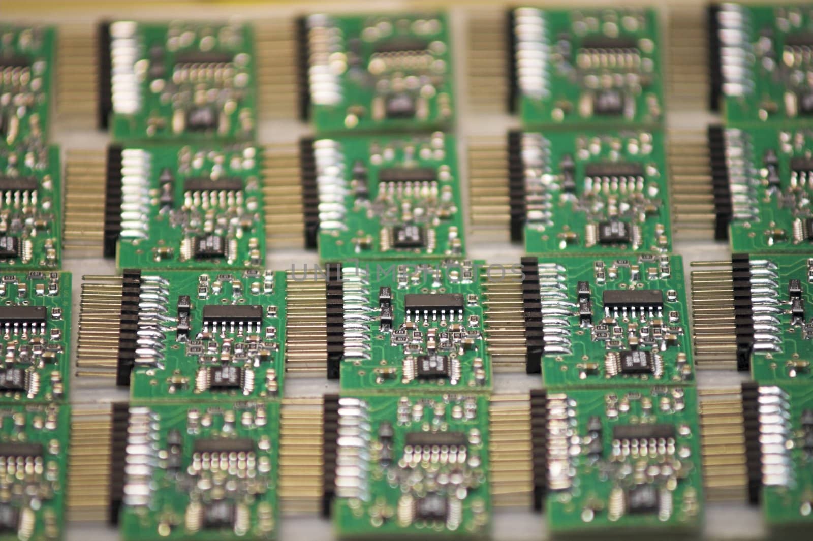 A stack of microchips lying on a table.