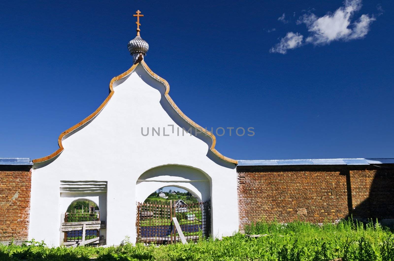 Gates to ancient Russian orthodox monastery by simfan