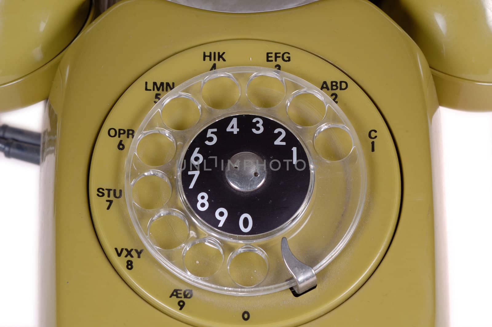 Green retro telephone taken on clean white background.