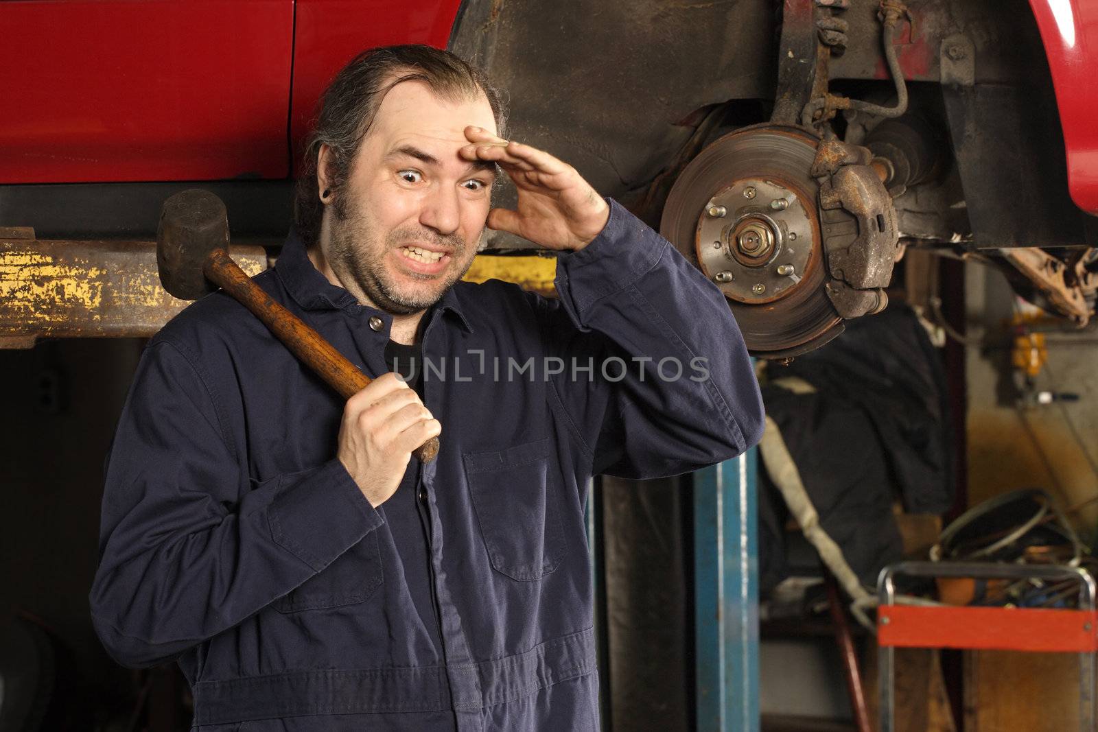 A crazy mechanic confused on what to do to fix the car.