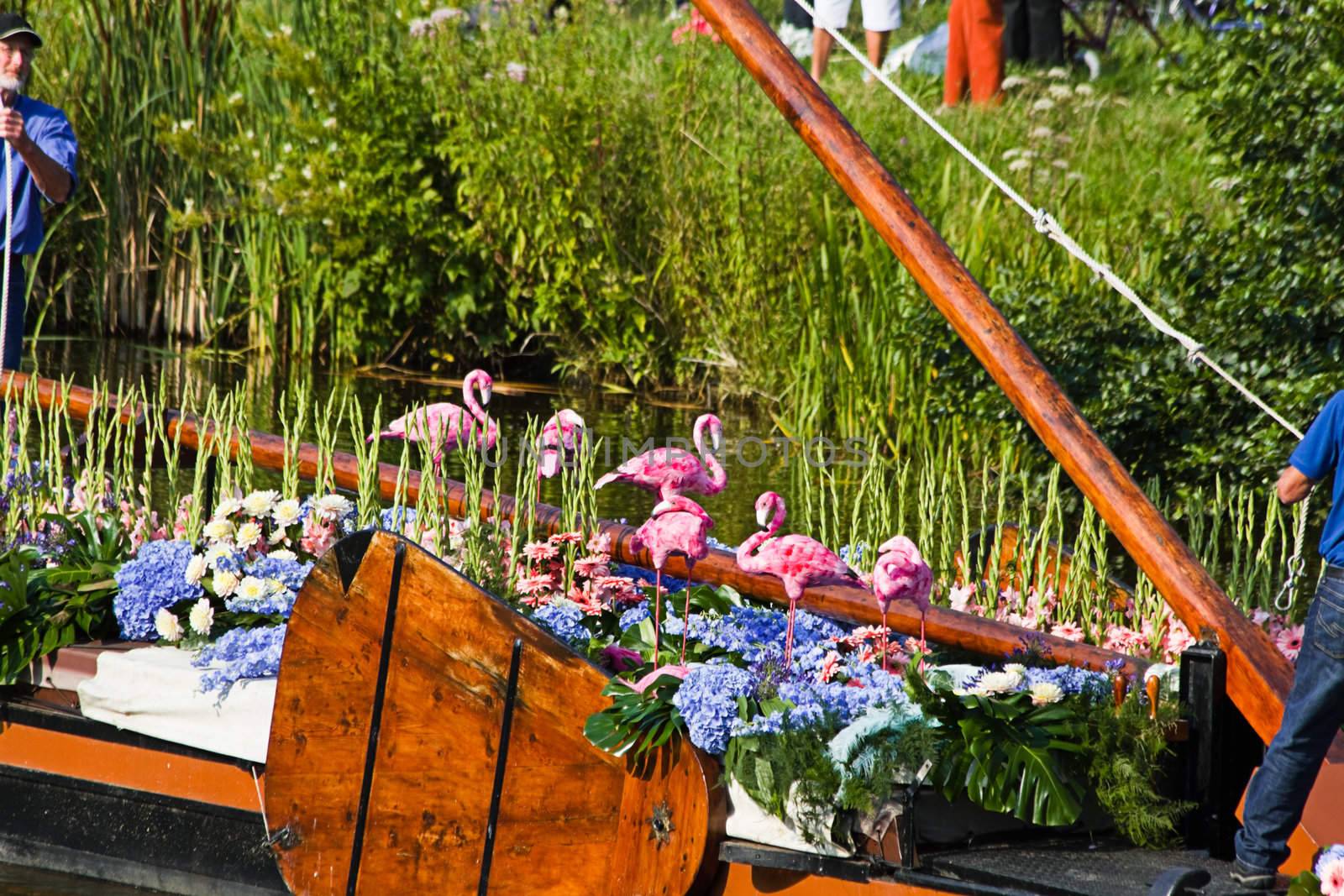 VLAARDINGEN, THE NETHERLANDS - JULI 2010: Beautiful flower boats in the unique annual Westland Floating Parade Juli 30, 2010, Vlaardingen, the Netherlands.

